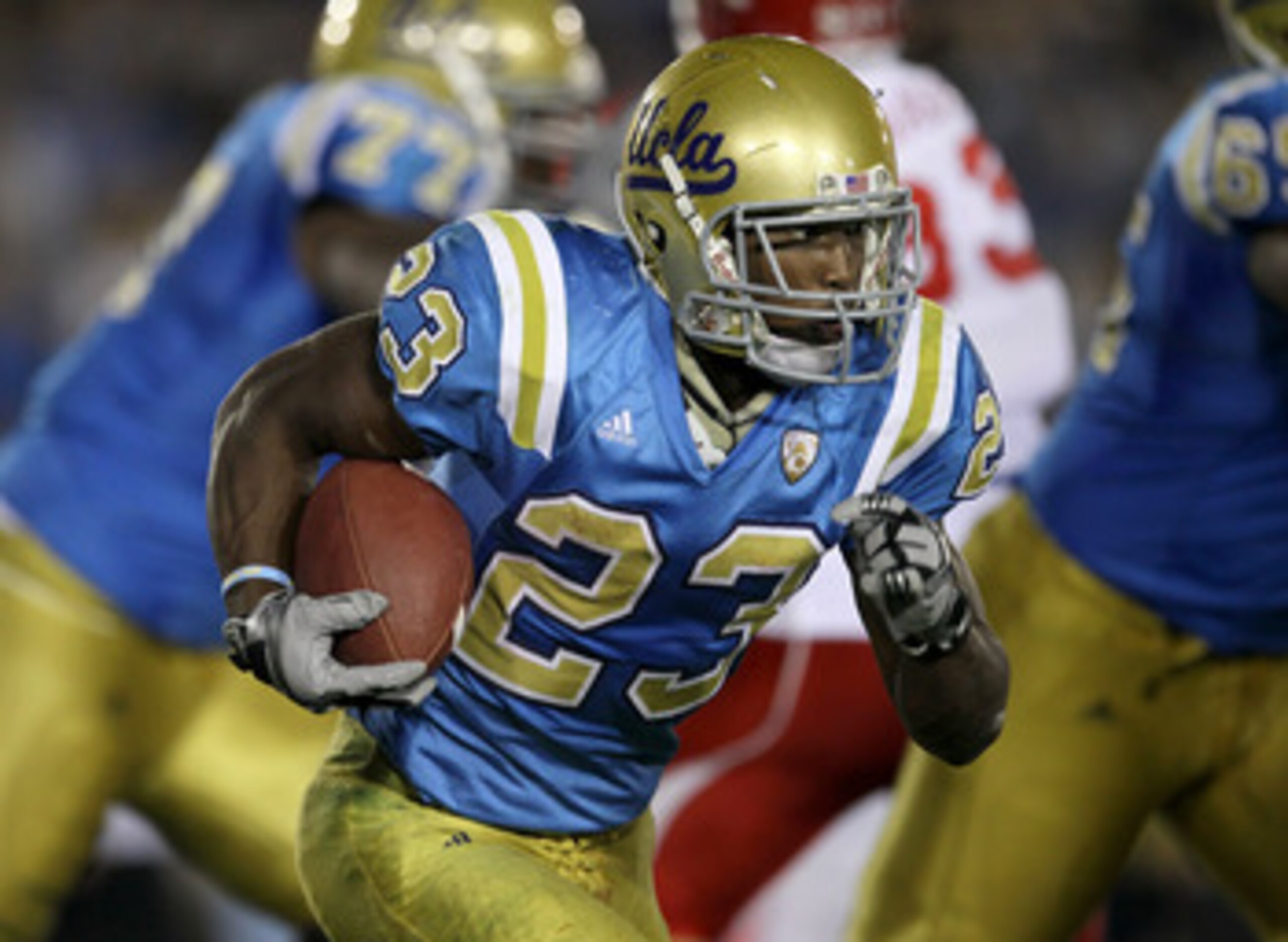 PASADENA, CA - SEPTEMBER 18: Running back Johnathan Franklin #23 of the UCLA Bruins carries the ball against the Houston Cougars in the second quarter at the Rose Bowl on September 18, 2010 in Pasadena, California. UCLA won 31-13. (Photo by Stephen Dun PASADENA, CA - SEPTEMBER 18: Running back Johnathan Franklin #23 of the UCLA Bruins carries the ball against the Houston Cougars in the second quarter at the Rose Bowl on September 18, 2010 in Pasadena, California. UCLA won 31-13. (Photo by Stephen Dun