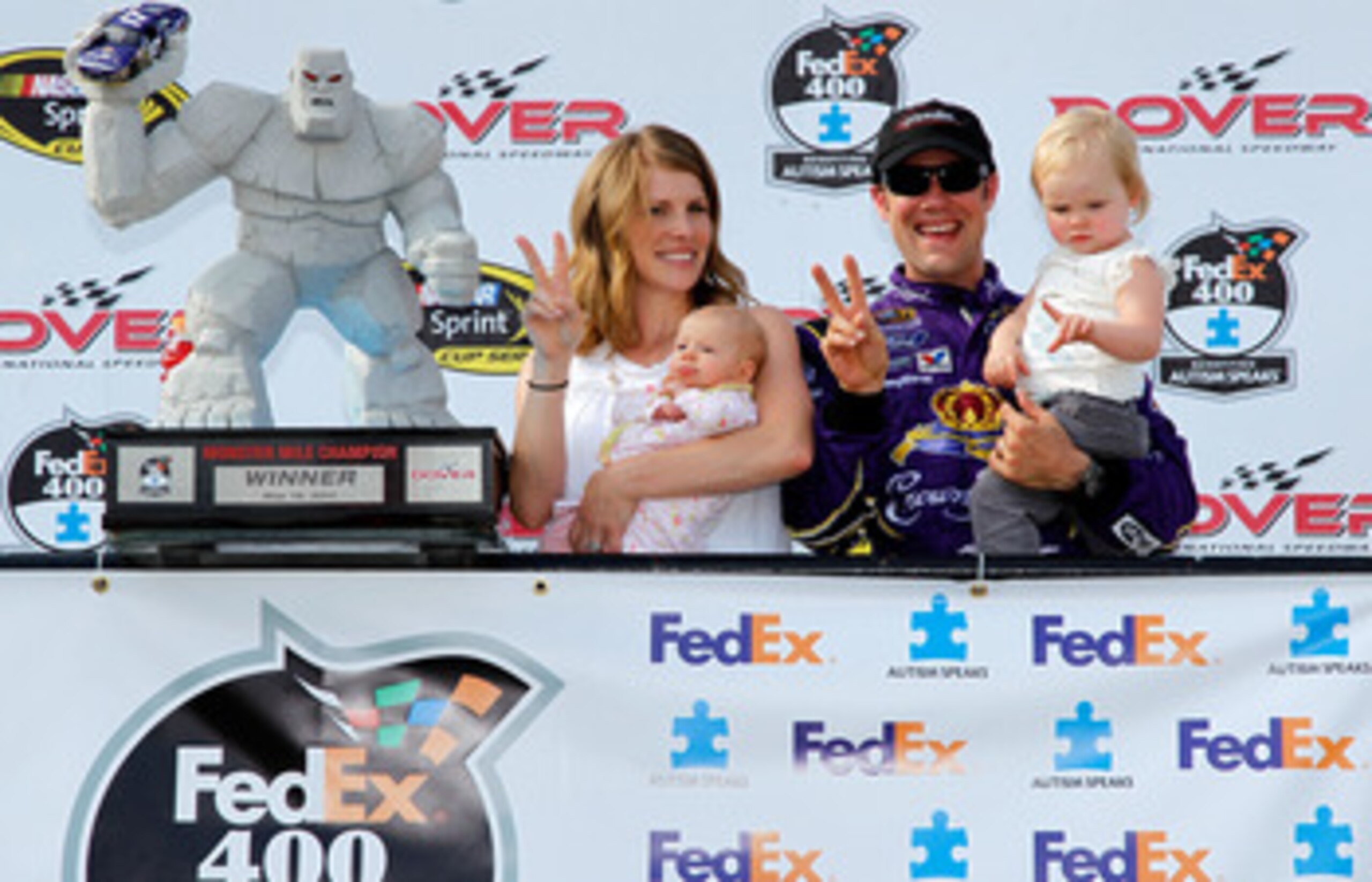 DOVER, DE - MAY 15: Matt Kenseth (2R), driver of the #17 Wiley X Sunglasses Ford, his wife, Katie(L), and children, Kaylin and Grace Kenseth, pose in Victory Lane during the NASCAR Sprint Cup Series FedEx 400 Benefiting Autism Speaks at Dover Internation DOVER, DE - MAY 15: Matt Kenseth (2R), driver of the #17 Wiley X Sunglasses Ford, his wife, Katie(L), and children, Kaylin and Grace Kenseth, pose in Victory Lane during the NASCAR Sprint Cup Series FedEx 400 Benefiting Autism Speaks at Dover Internation