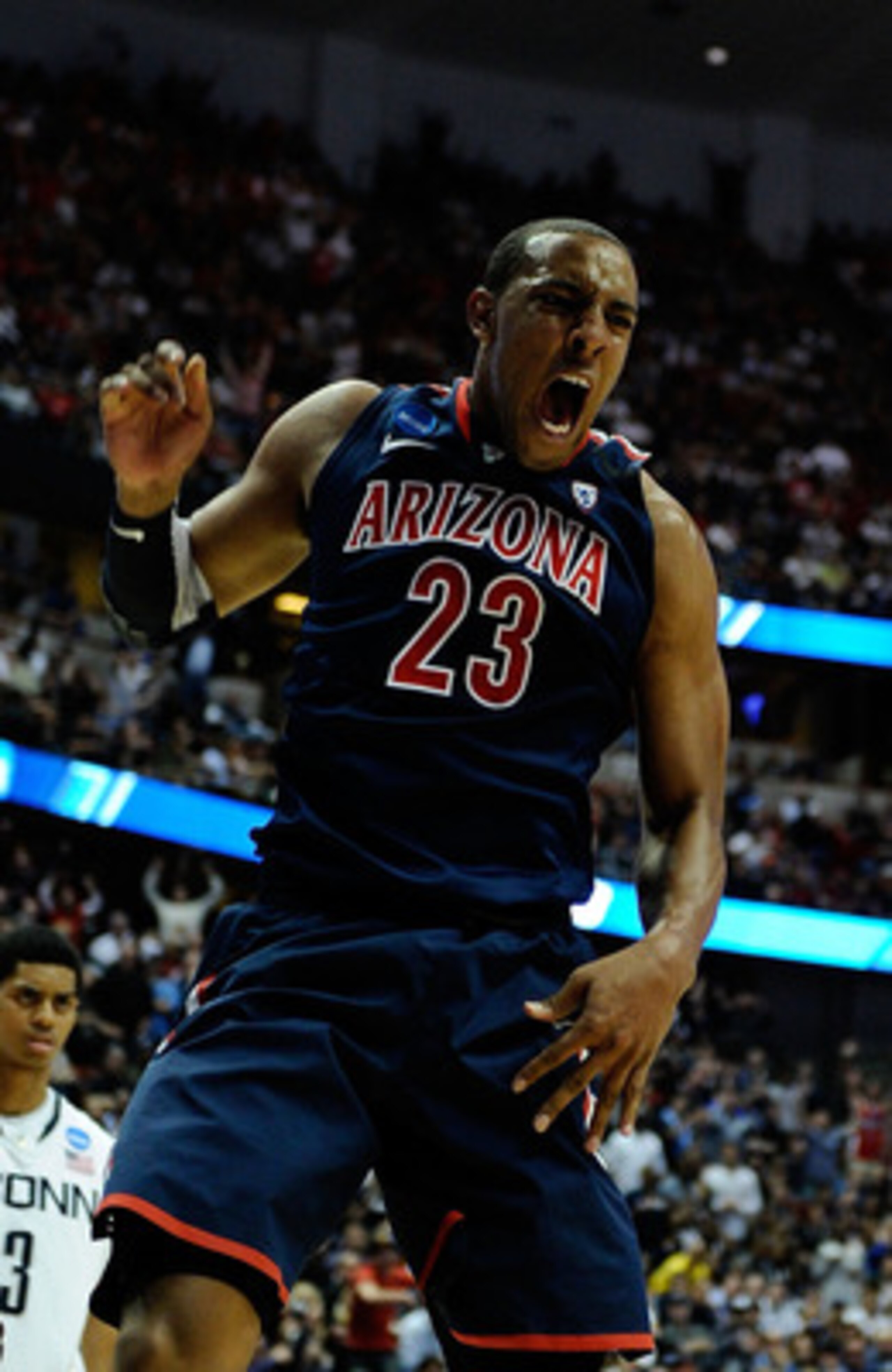 ANAHEIM, CA - MARCH 26:  Derrick Williams #23 of the Arizona Wildcats reacts after a dunk against of the Connecticut Huskies during the west regional final of the 2011 NCAA men's basketball tournament at the Honda Center on March 26, 2011 in Anaheim, Cali