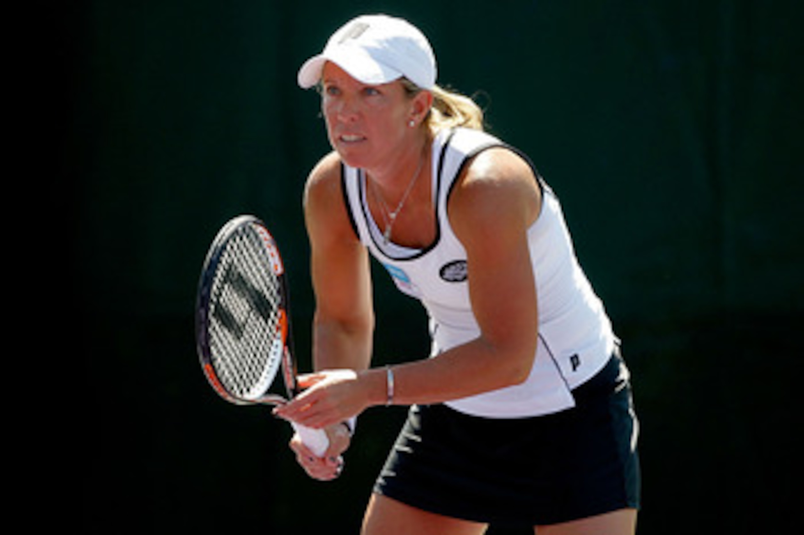 KEY BISCAYNE, FL - MARCH 26: Lisa Raymond (doubles partner of Julia Goerges of Germany) awaits a serve during her doubles match against Maria Kirilenko of Russia and Anastasia Pavlyuchenkova of Russia during the Sony Ericsson Open at Crandon Park Tennis C