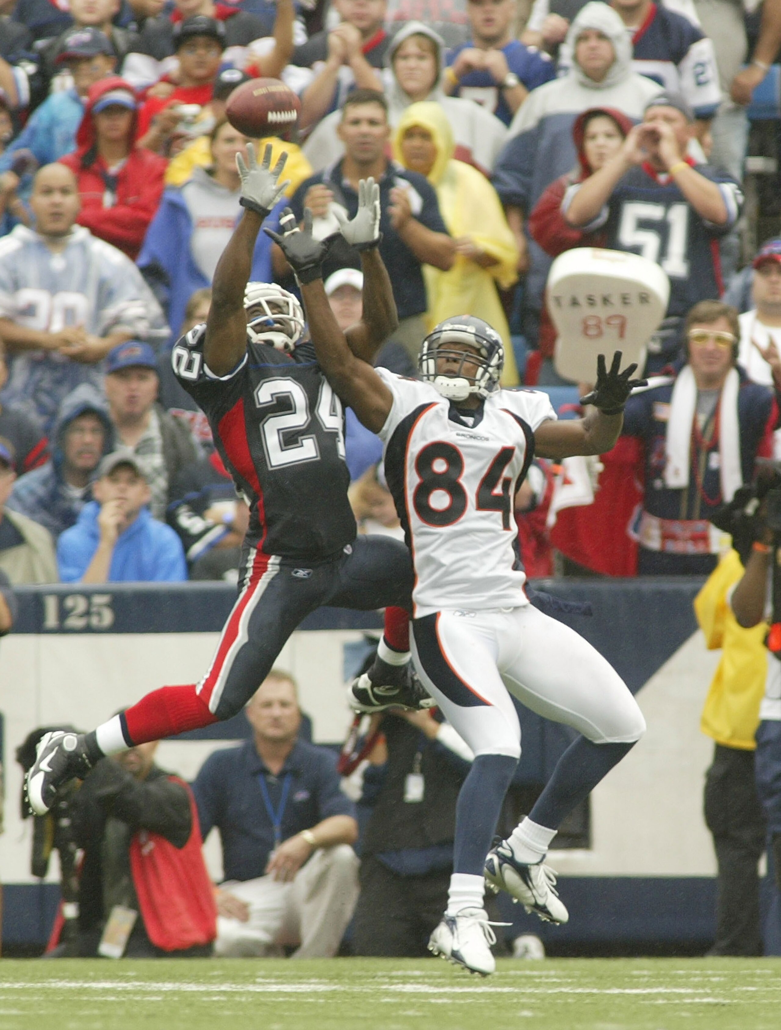 ORCHARD PARK, NY - SEPTEMBER 9:  Terrence McGee #24 of the Buffalo Bills goes up to knock the ball away from Javon Walker #84 of the Denver Broncos at Ralph Wilson Stadium September 9, 2007 in Orchard Park, New York. Denver won 15-14. (Photo by Rick Stewa