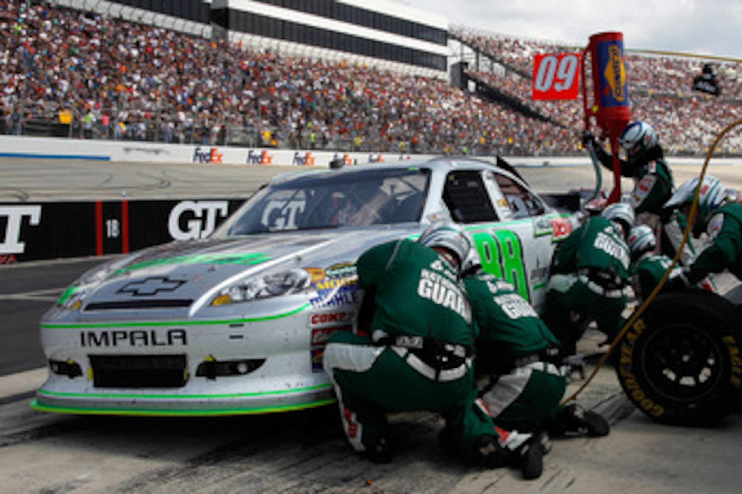DOVER, DE - MAY 15: Dale Earnhardt Jr., driver of the #88 AMP Energy Sugar-Free/National Guard Chevrolet, comes in for a pit stop during the NASCAR Sprint Cup Series FedEx 400 Benefiting Autism Speaks at Dover International Speedway on May 15, 2011 in Do DOVER, DE - MAY 15: Dale Earnhardt Jr., driver of the #88 AMP Energy Sugar-Free/National Guard Chevrolet, comes in for a pit stop during the NASCAR Sprint Cup Series FedEx 400 Benefiting Autism Speaks at Dover International Speedway on May 15, 2011 in Do