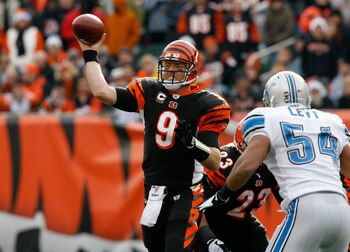 CINCINNATI, OH - DECEMBER 6: Carson Palmer #9 of the Cincinnati Bengals throws under pressure from DeAndre Levy #54 of the Detroit Lions in their NFL game at Paul Brown Stadium December 6, 2009 in Cincinnati, Ohio.    (Photo by John Sommers II/Getty Image