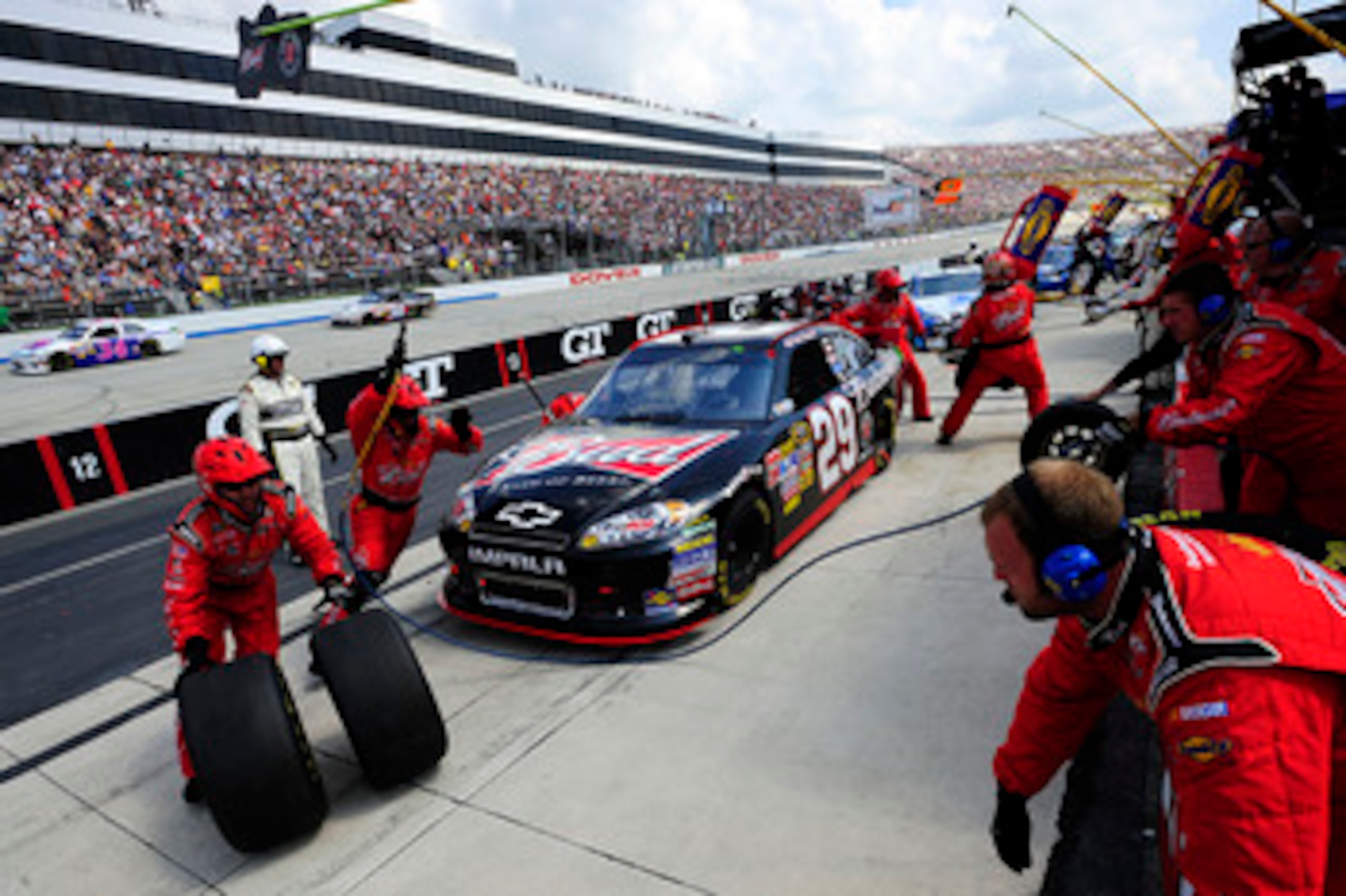DOVER, DE - MAY 15: Kevin Harvick, driver of the #29 Budweiser Chevrolet, pits during the NASCAR Sprint Cup Series FedEx 400 Benefiting Autism Speaks at Dover International Speedway on May 15, 2011 in Dover, Delaware. (Photo by Jason Smith/Getty Images DOVER, DE - MAY 15: Kevin Harvick, driver of the #29 Budweiser Chevrolet, pits during the NASCAR Sprint Cup Series FedEx 400 Benefiting Autism Speaks at Dover International Speedway on May 15, 2011 in Dover, Delaware. (Photo by Jason Smith/Getty Images