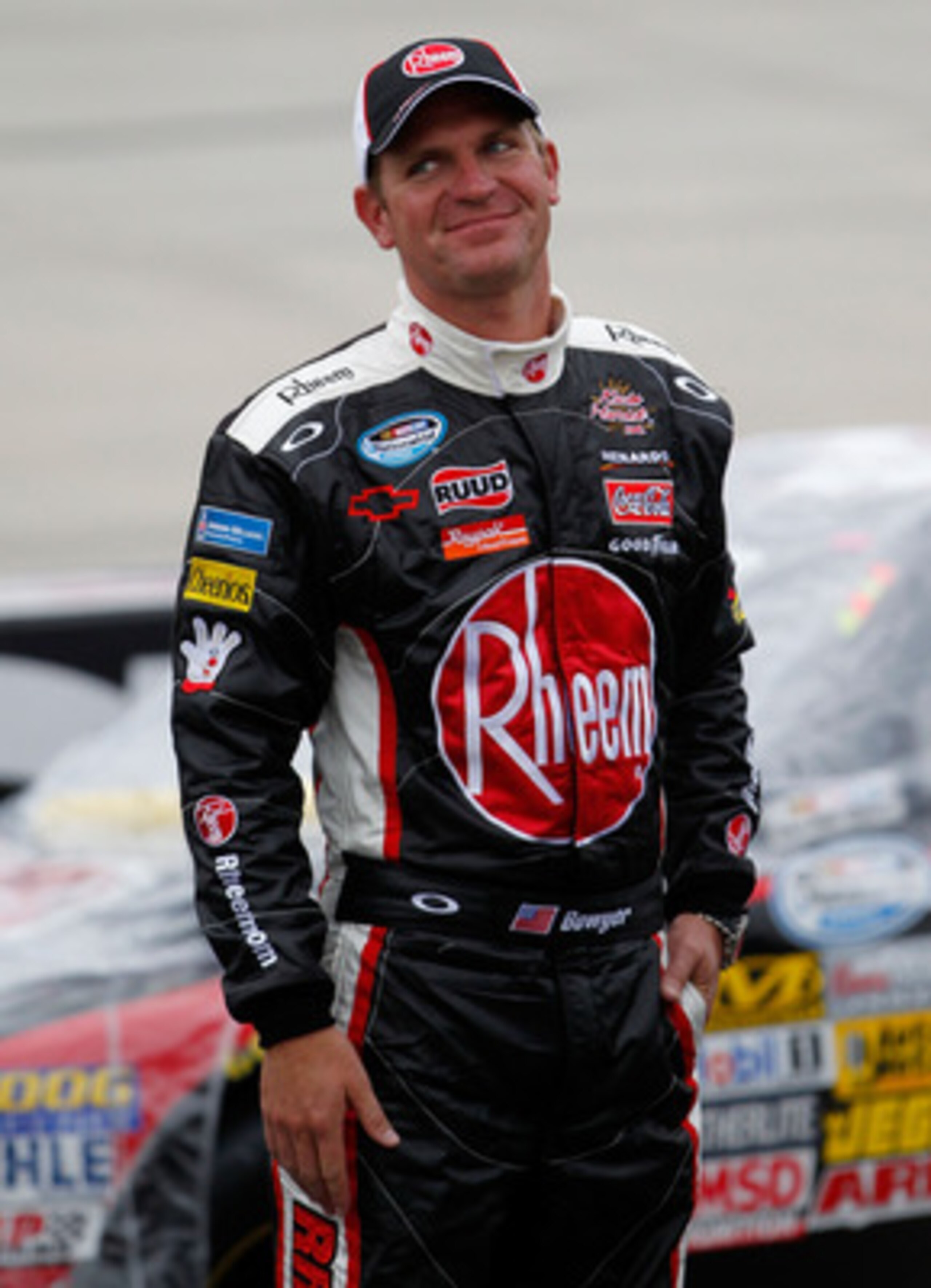 DOVER, DE - MAY 14: Clint Bowyer, driver of the #33 Rheem Heating, Cooling & Water Heating Chevrolet, stands on pit road during a red flag stoppage in the NASCAR Nationwide Series 5-hour ENERGY 200 at Dover International Speedway on May 14, 2011 in Dover, DOVER, DE - MAY 14: Clint Bowyer, driver of the #33 Rheem Heating, Cooling & Water Heating Chevrolet, stands on pit road during a red flag stoppage in the NASCAR Nationwide Series 5-hour ENERGY 200 at Dover International Speedway on May 14, 2011 in Dover,