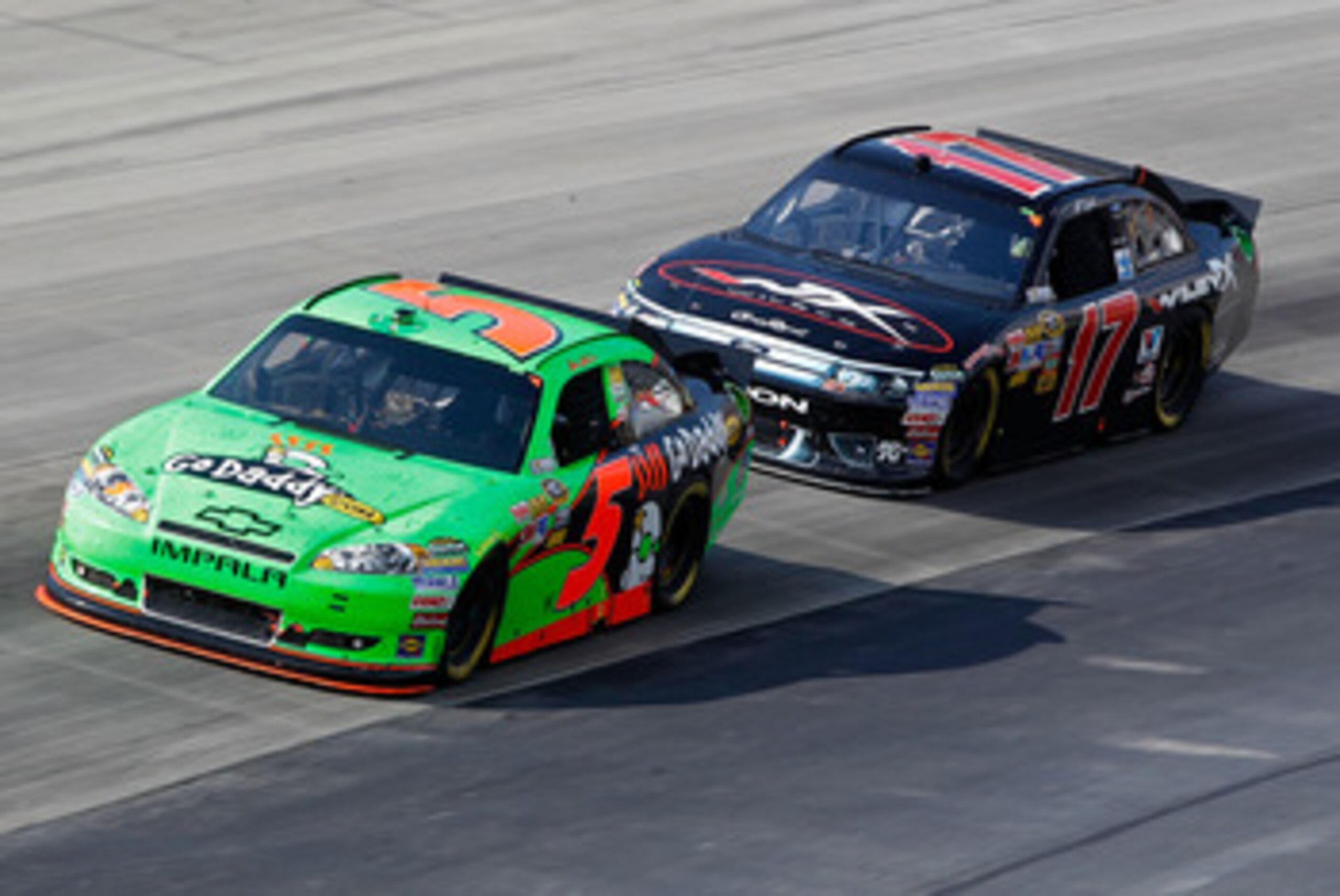DOVER, DE - MAY 15: Mark Martin, driver of the #5 GoDaddy.com Chevrolet, races Matt Kenseth, driver of the #17 Wiley-X Ford, during the NASCAR Sprint Cup Series FedEx 400 Benefiting Autism Speaks at Dover International Speedway on May 15, 2011 in Dover, D DOVER, DE - MAY 15: Mark Martin, driver of the #5 GoDaddy.com Chevrolet, races Matt Kenseth, driver of the #17 Wiley-X Ford, during the NASCAR Sprint Cup Series FedEx 400 Benefiting Autism Speaks at Dover International Speedway on May 15, 2011 in Dover, D