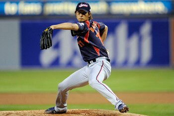SAN DIEGO - MARCH 17:  Yu Darvish #11 of Japan pitches against Korea during the 2009 World Baseball Classic Round 2 Pool 1 Game 4 on March 17, 2009 at Petco Park in San Diego, California.  (Photo by Kevork Djansezian/Getty Images)