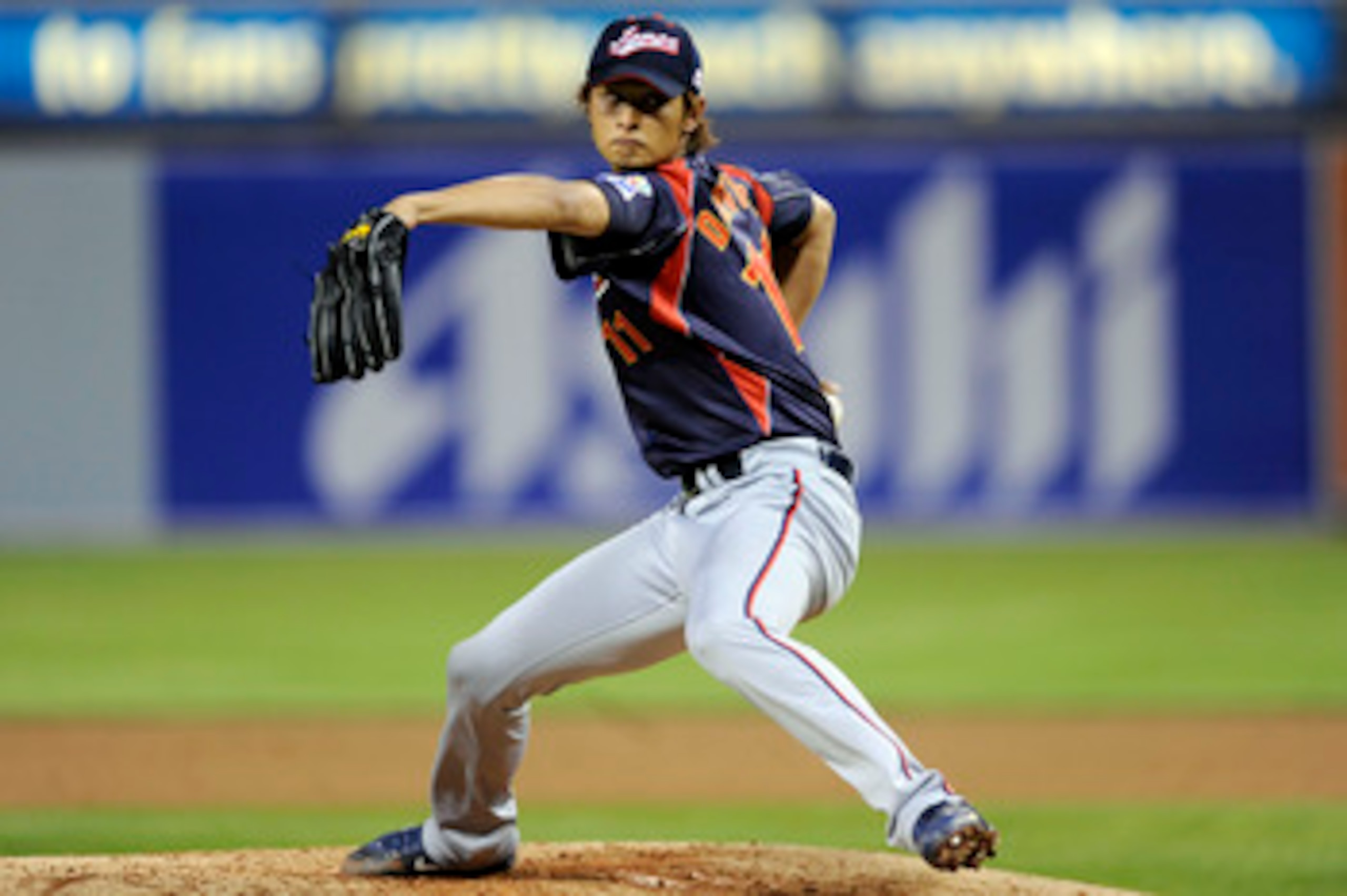SAN DIEGO - MARCH 17:  Yu Darvish #11 of Japan pitches against Korea during the 2009 World Baseball Classic Round 2 Pool 1 Game 4 on March 17, 2009 at Petco Park in San Diego, California.  (Photo by Kevork Djansezian/Getty Images)