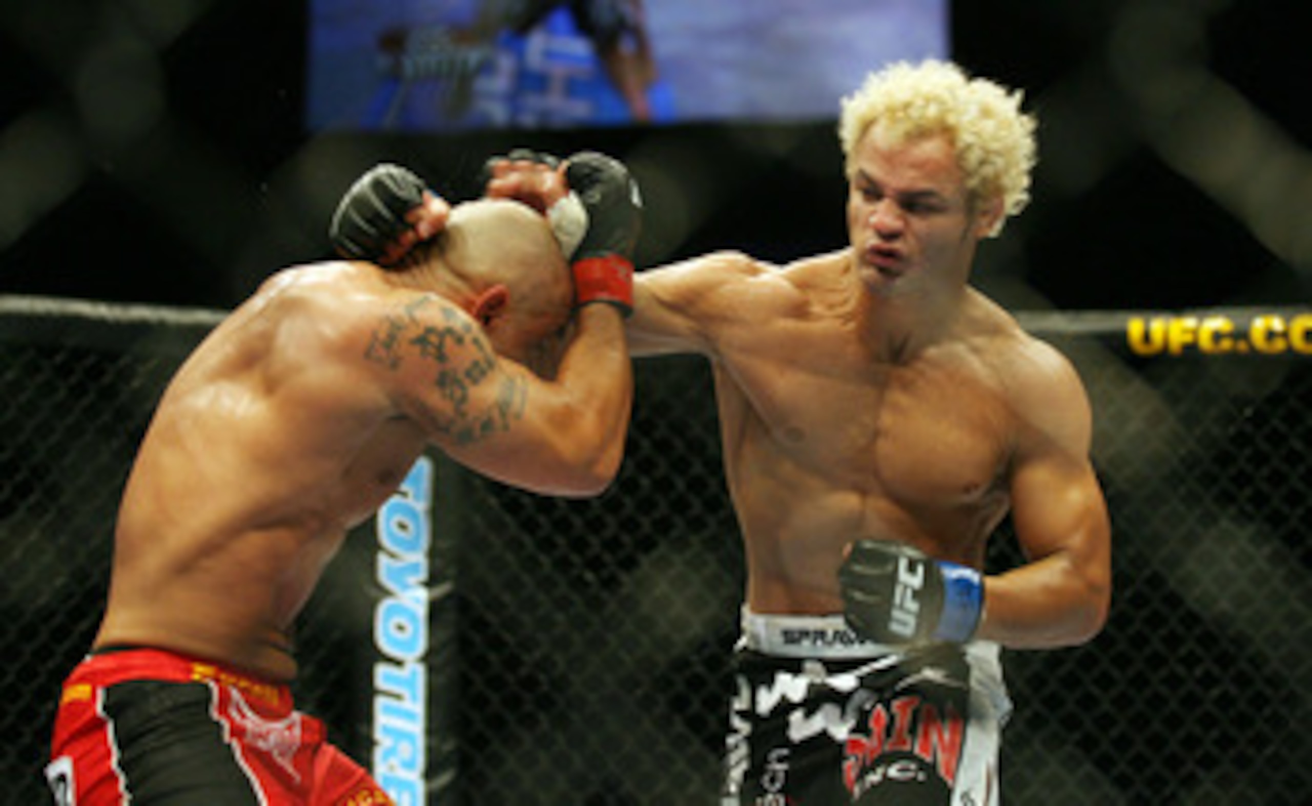 CHICAGO- OCTOBER 25: Josh Koscheck (R) punches Thiago Alves in a Welterweight bout  at UFC's Ultimate Fight Night at Allstate Arena on October 25, 2008 in Chicago, Illinois. (Photo by Tasos Katopodis/Getty Images)