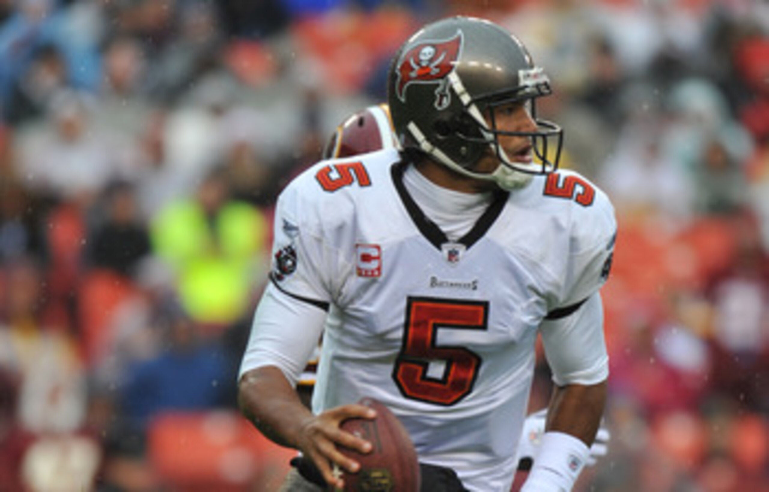 LANDOVER, MD - DECEMBER 12: Josh Freeman #5 of the Tampa Bay Buccaneers scrambles during the game against the Washington Redskins at FedExField on December 12, 2010 in Landover, Maryland. The Buccaneers defeated the Redskins 17-16. (Photo by Larry Frenc LANDOVER, MD - DECEMBER 12: Josh Freeman #5 of the Tampa Bay Buccaneers scrambles during the game against the Washington Redskins at FedExField on December 12, 2010 in Landover, Maryland. The Buccaneers defeated the Redskins 17-16. (Photo by Larry Frenc