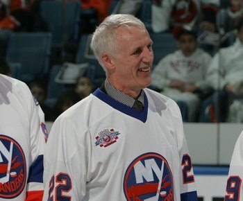 UNIONDALE, NY - MARCH 02:  (L-R) Clark Gillies, Mike Bossy and Bryan Trottier of 'The 'Core of the Four' New York Islanders Stanley Cup championships take part in a ceremony prior to the Islanders game against the Florida Panthers on March 2, 2008 at the