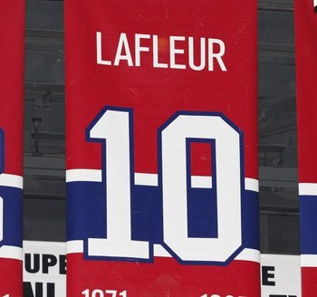 MONTREAL- APRIL 19:  A photo of the banners commemorating the retired jerseys of Serge Savard, Guy Lafleur and Larry Robinson hanging in the Bell Centre prior to Game Three of the Eastern Conference Quarterfinals between the Washington Capitals and Montre