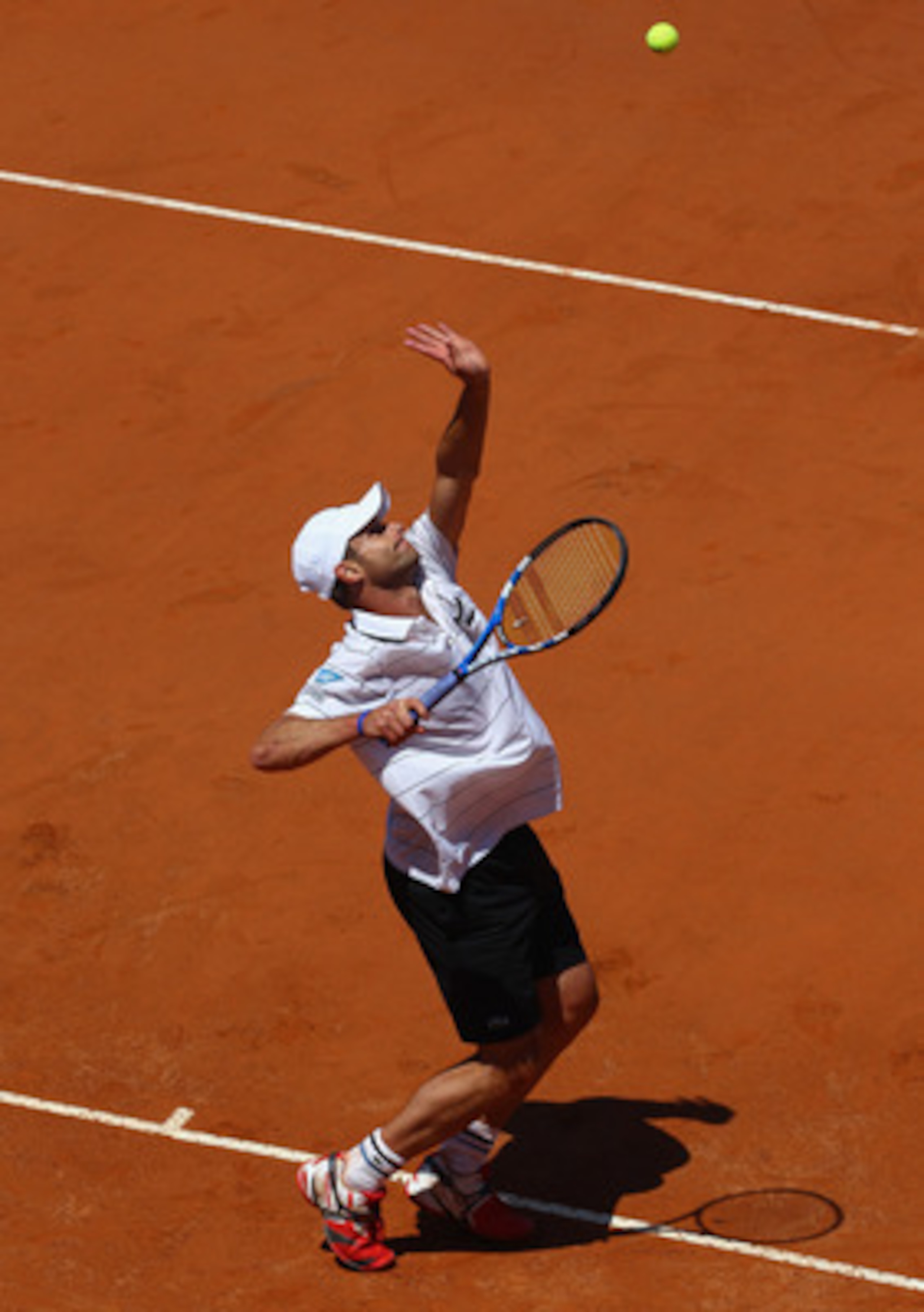 ROME, ITALY - MAY 09:  Andy Roddick of the USA serves during his first round match against Gilles Simon of France during day two of the Internazoinali BNL D'Italia at the Foro Italico Tennis Centre on May 9, 2011 in Rome, Italy.  (Photo by Clive Brunskill