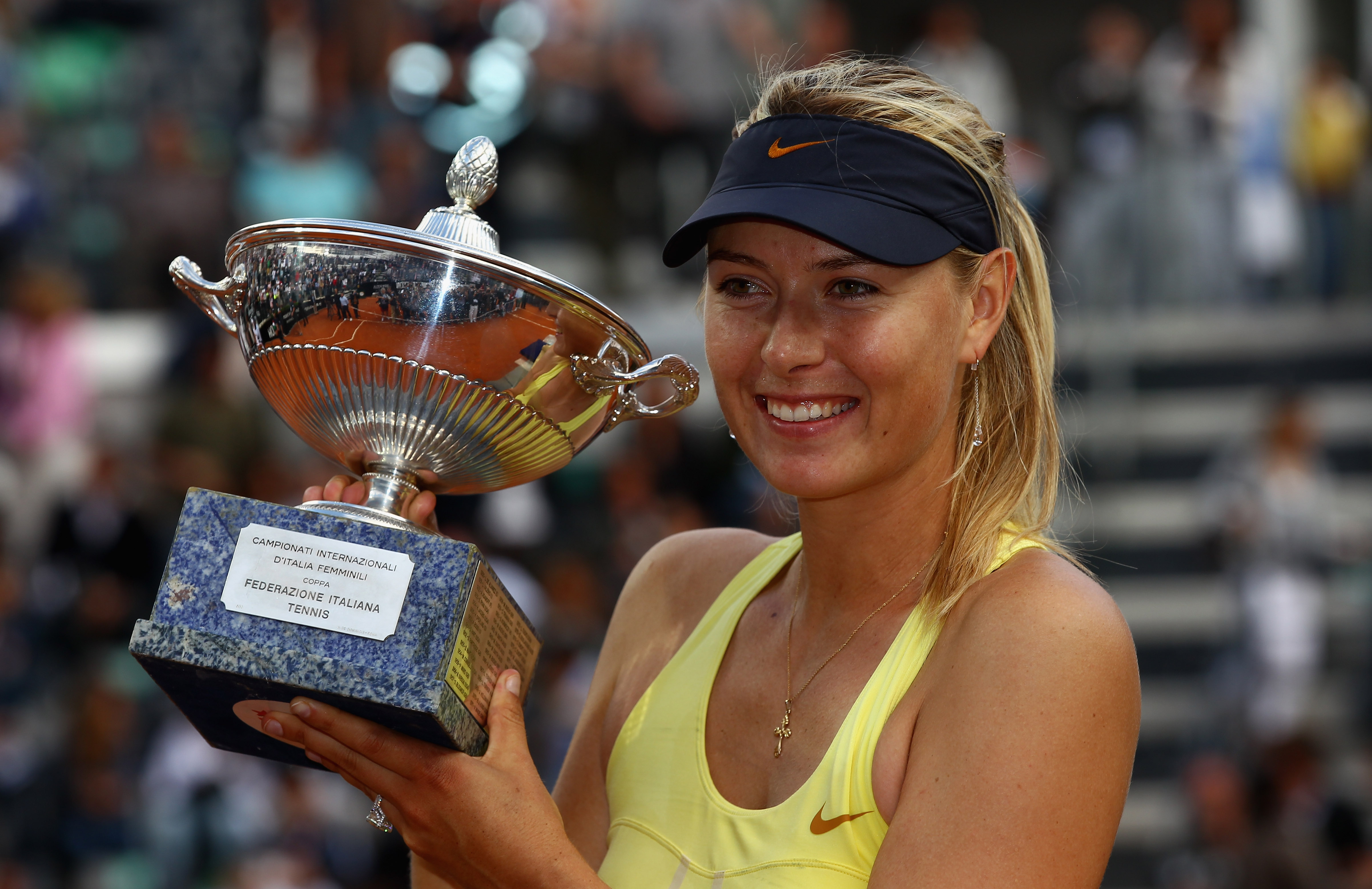 ROME, ITALY - MAY 15:  Maria Sharapova of Russia poses with the trophy after her victory in the final against Samantha Stosur of Australia during day eight of the Internazoinali BNL D'Italia at the Foro Italico Tennis Centre on May 15, 2011 in Rome, Italy