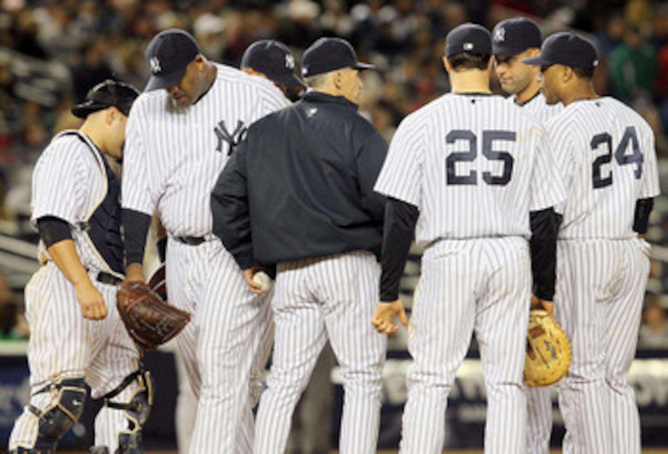 NEW YORK, NY - MAY 14:  CC Sabathia #52 of the New York Yankees leaves the game in the seventh inning against the Boston Red Sox after giving the ball to manager Joe Girardi on May 14, 2011 at Yankee Stadium in the Bronx borough of New York City.  (Photo 