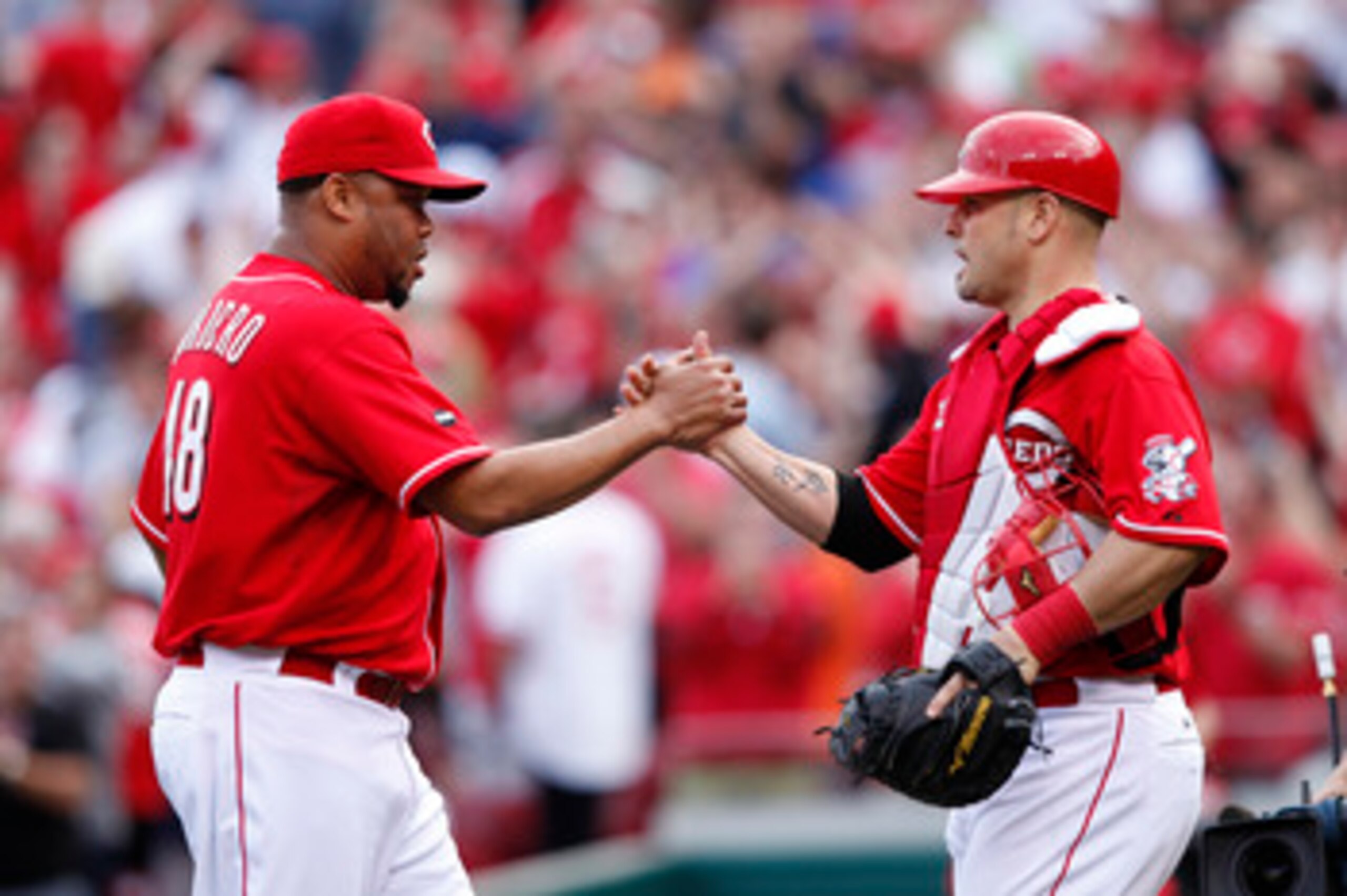 CINCINNATI, OH - MAY 14: Francisco Cordero #48 and Ramon Hernandez #55 of the Cincinnati Reds celebrate after the final out against the St. Louis Cardinals at Great American Ball Park on May 14, 2011 in Cincinnati, Ohio. The Reds defeated the Cardinals 7-