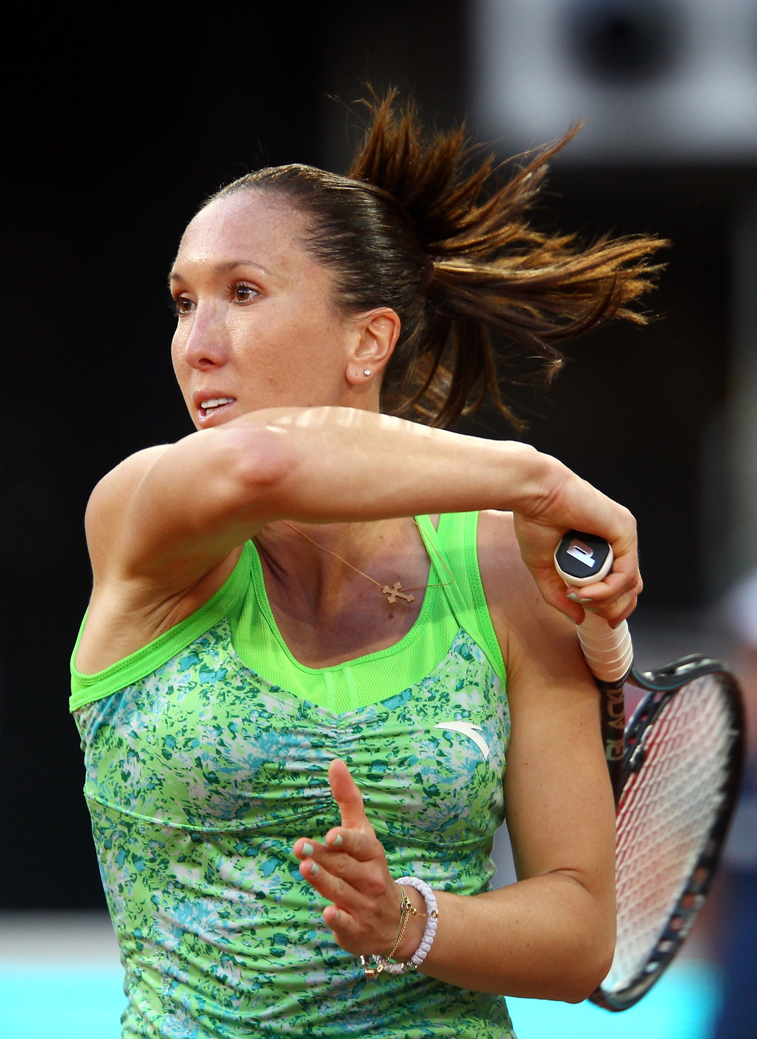 MADRID, SPAIN - MAY 01:  Jelena Jankovic of Serbia in action against Laura Pous-Tio of Spain during day two of the Mutua Madrilena Madrid Open Tennis on May 1, 2011 in Madrid, Spain.  (Photo by Julian Finney/Getty Images)