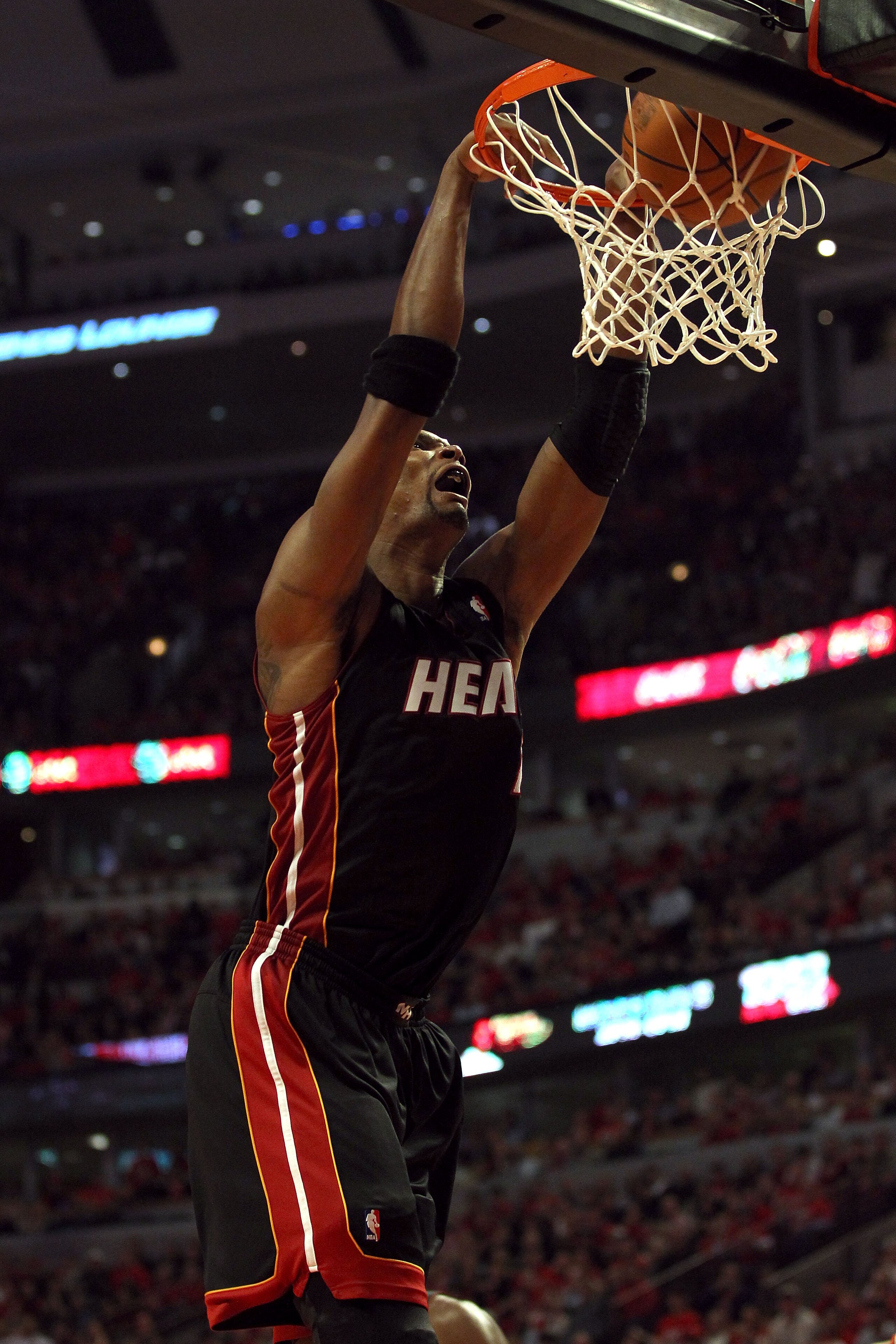 CHICAGO, IL - MAY 15: Chris Bosh #1 of the Miami Heat dunks against the Chicago Bulls in Game One of the Eastern Conference Finals during the 2011 NBA Playoffs on May 15, 2011 at the United Center in Chicago, Illinois. NOTE TO USER: User expressly acknowl