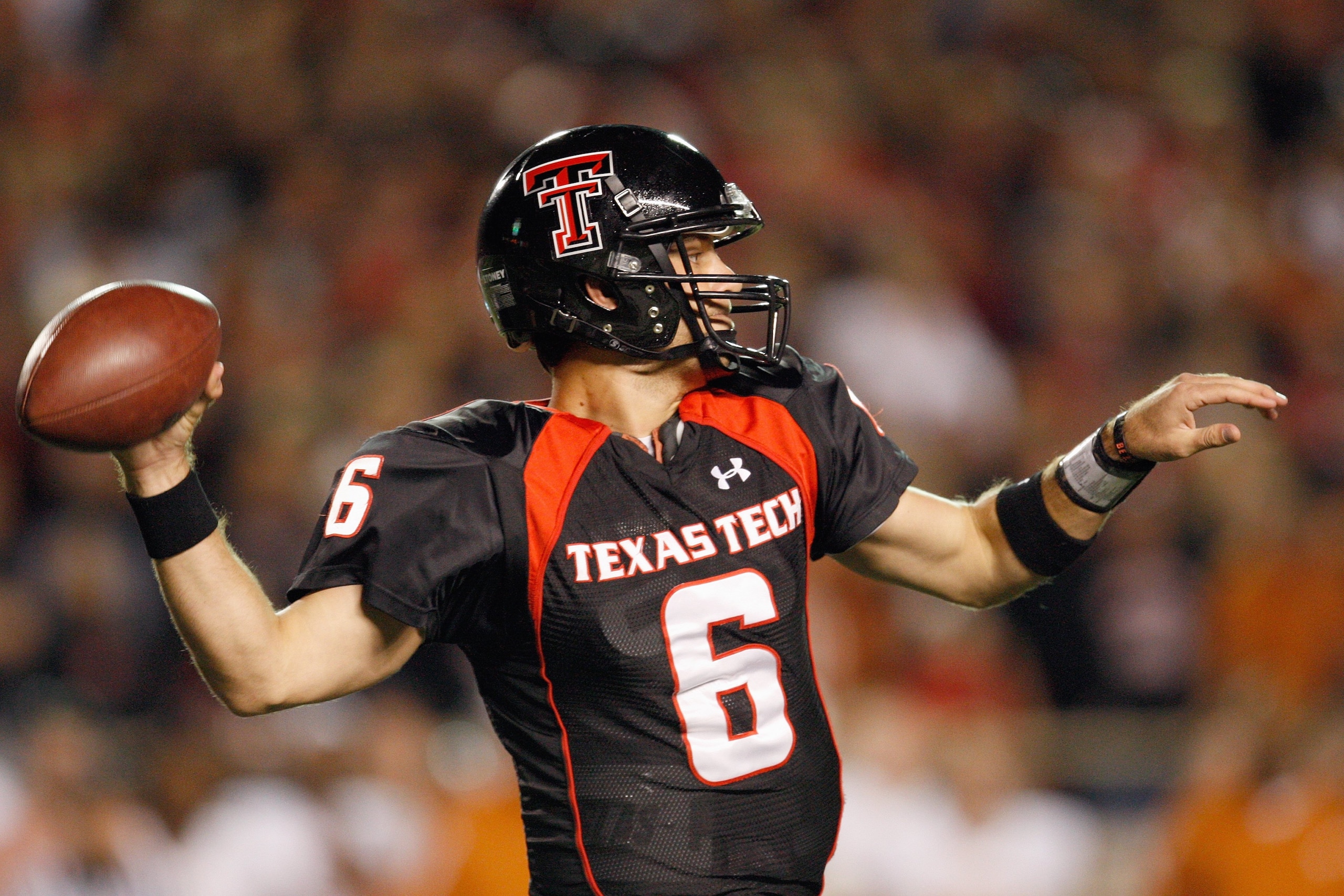 LUBBOCK, TEXAS - NOVEMBER 1:  Quarterback Graham Harrell #6 of the Texas Tech Red Raiders looks to pass the ball down the field during the game against the Texas Longhorns on November 1, 2008 at Jones Stadium in Lubbock, Texas. (Photo by: Jamie Squire/Get
