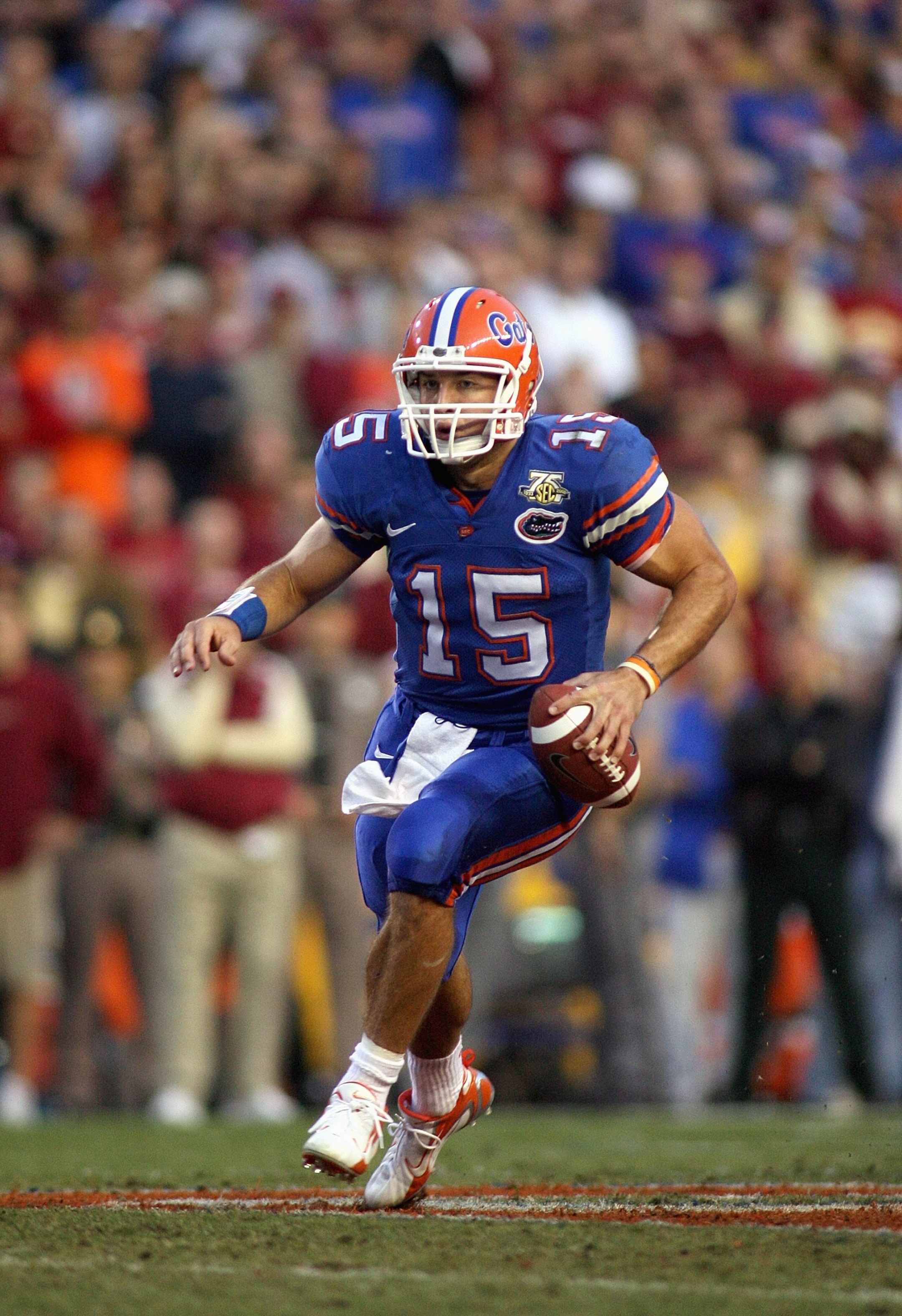 GAINESVILLE, FL - NOVEMBER 24: Quarterback Tim Tebow #15 of the Florida Gators rolls out against the Florida State Seminoles at Ben Hill Griffin Stadium November 24, 2007 in Gainesville, Florida. (Photo by Marc Serota/Getty Images)