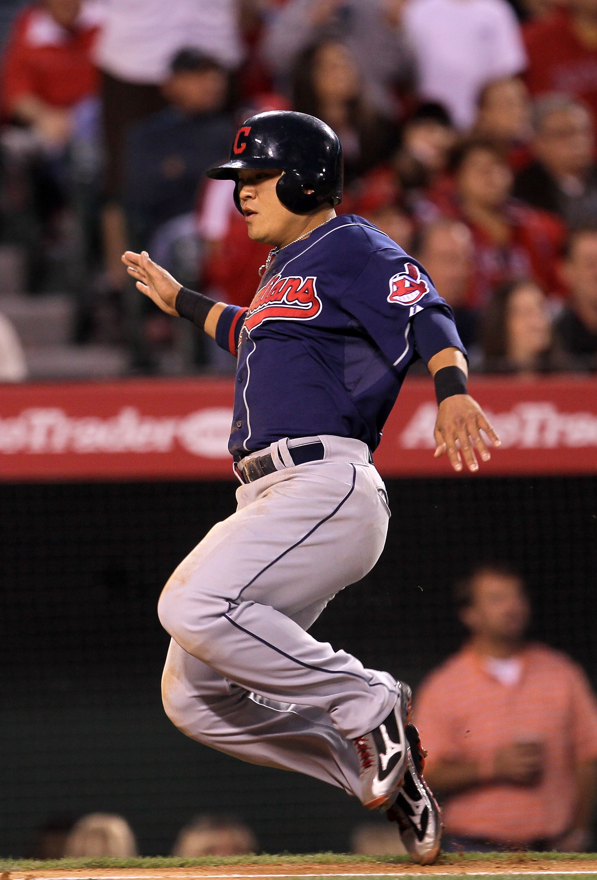 ANAHEIM, CA - MAY 07:  Shin-Soo Choo #17 of the Cleveland Indians sliodes home to score a run in the fifth inning against the Los Angeles Angels of Anaheim on May 7, 2011 at Angel Stadium in Anaheim, California.  (Photo by Stephen Dunn/Getty Images)