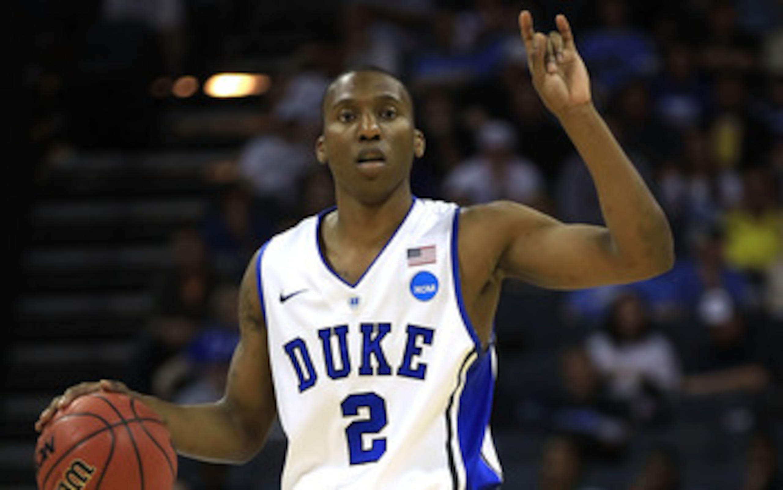CHARLOTTE, NC - MARCH 20:  Nolan Smith #2 of the Duke Blue Devils calls a play in the second half while taking on the Michigan Wolverines during the third round of the 2011 NCAA men's basketball tournament at Time Warner Cable Arena on March 20, 2011 in C