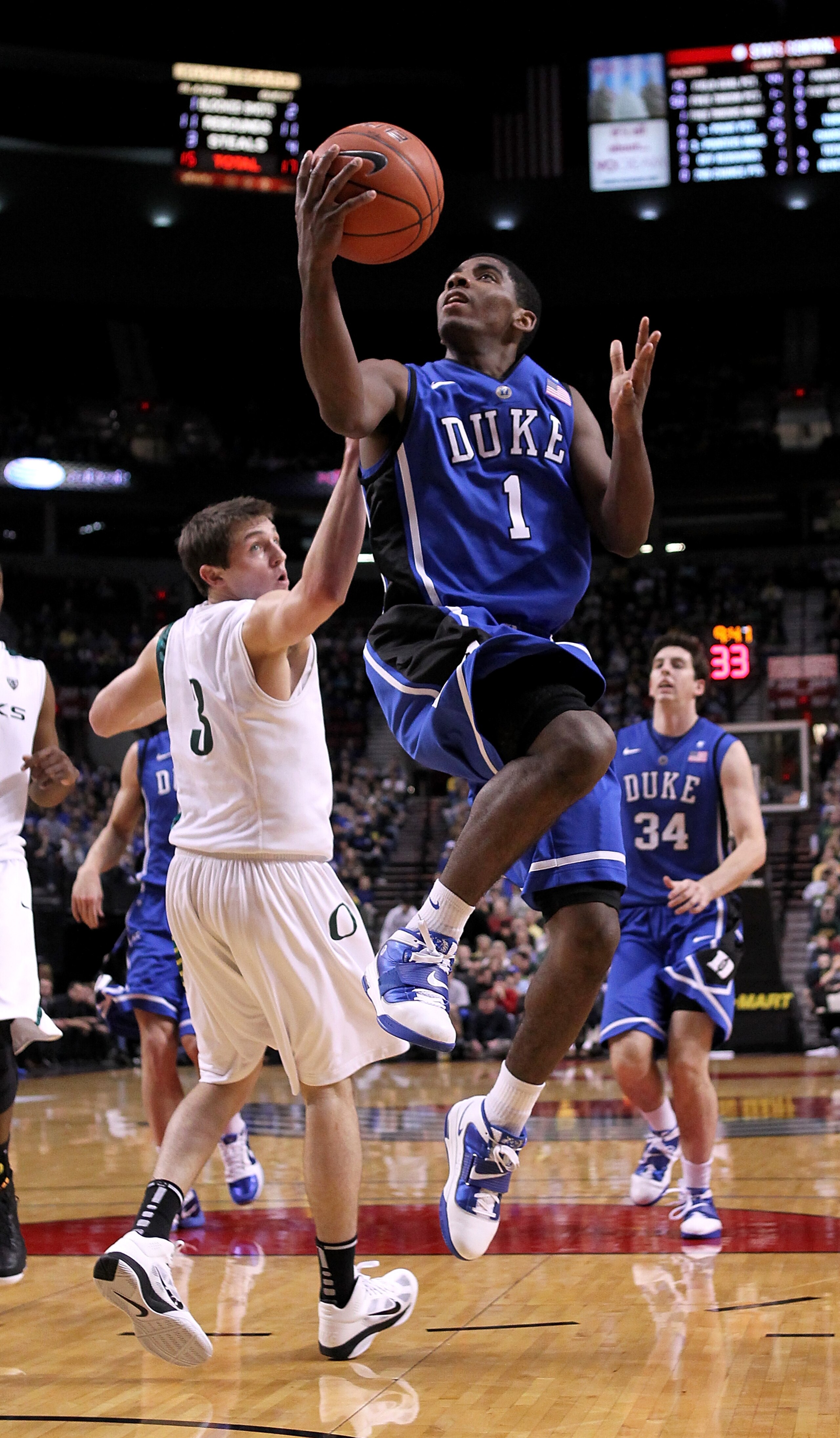PORTLAND, OR - NOVEMBER 27:  Kyrie Irving #1 of the Duke Blue Devils goes for a layup against the Oregon Ducks on November 27, 2010 at the Rose Garden in Portland, Oregon.  (Photo by Jonathan Ferrey/Getty Images)