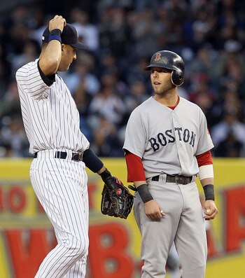 NEW YORK, NY - MAY 14:  Dustin Pedroia #15 of the Boston Red Sox talks to Derek Jeter #2 of the New York Yankees during the first inning on May 14, 2011 at Yankee Stadium in the Bronx borough of New York City.  (Photo by Jim McIsaac/Getty Images)