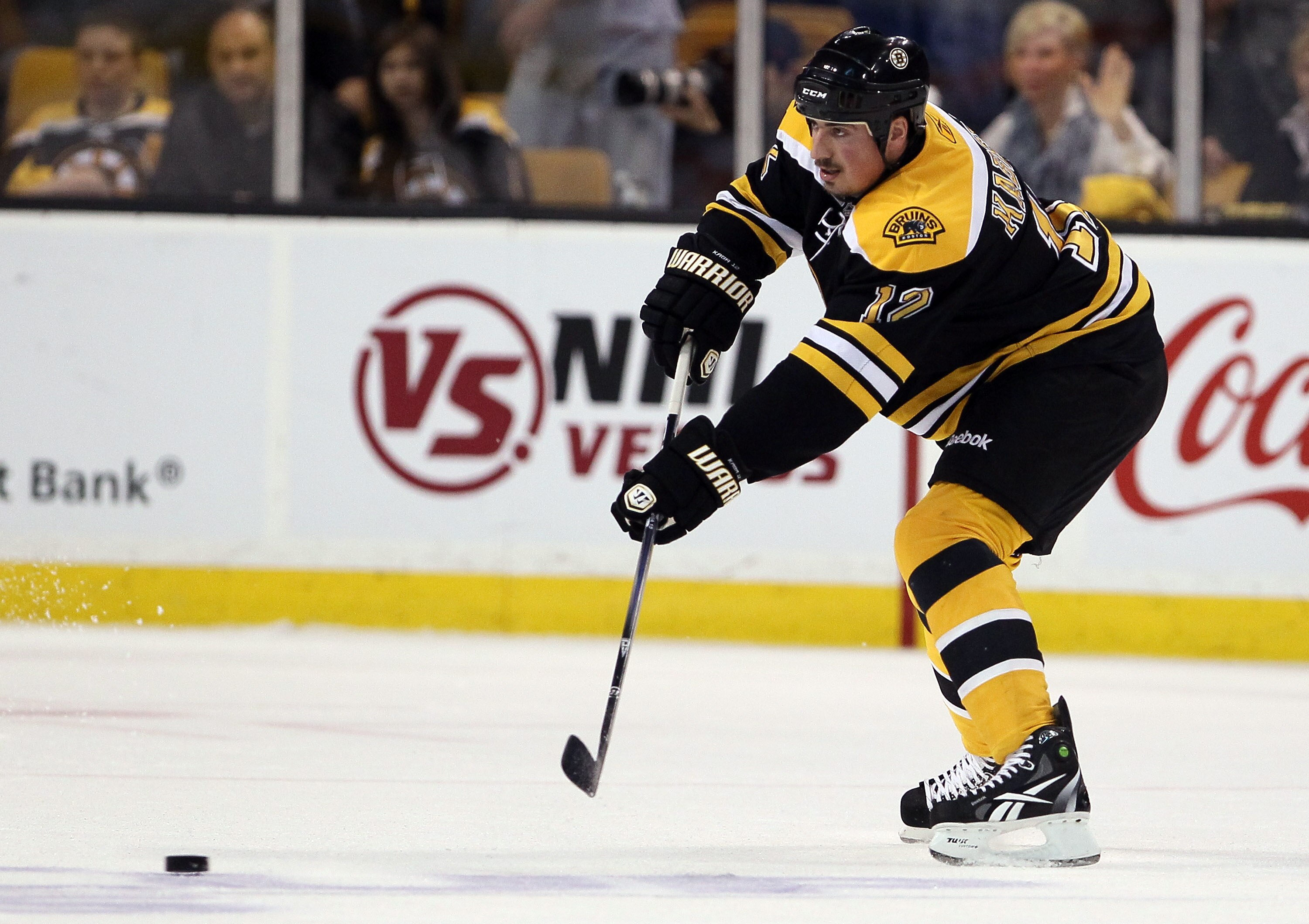 BOSTON, MA - MAY 06: Tomas Kaberle #12 of the Boston Bruins passes the puck in the second period against the Philadelphia Flyers in Game Four of the Eastern Conference Semifinals during the 2011 NHL Stanley Cup Playoffs at TD Garden on May 6, 2011 in Bost