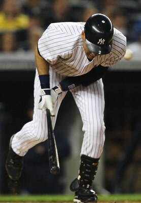 NEW YORK, NY - MAY 15:  Derek Jeter #2 of the New York Yankees is hits a by a pitch during their game against the Boston Red Sox on May 15, 2011 at Yankee Stadium in the Bronx borough of New York City.  (Photo by Al Bello/Getty Images)