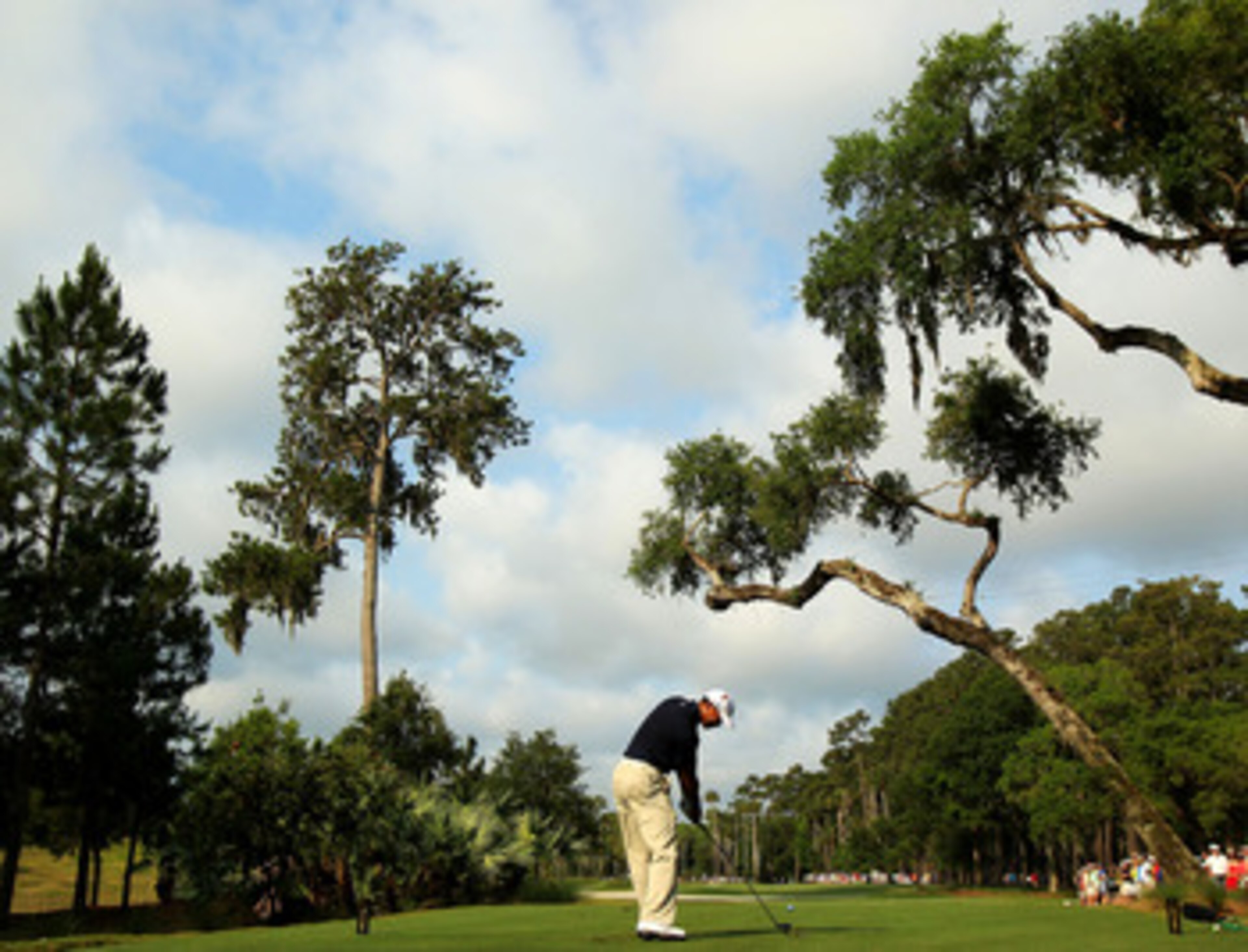 PONTE VEDRA BEACH, FL - MAY 12: Tiger Woods hits his tee shot on the sixth hole during the first round of THE PLAYERS Championship held at THE PLAYERS Stadium course at TPC Sawgrass on May 12, 2011 in Ponte Vedra Beach, Florida. Woods withdrew after shoo PONTE VEDRA BEACH, FL - MAY 12: Tiger Woods hits his tee shot on the sixth hole during the first round of THE PLAYERS Championship held at THE PLAYERS Stadium course at TPC Sawgrass on May 12, 2011 in Ponte Vedra Beach, Florida. Woods withdrew after shoo