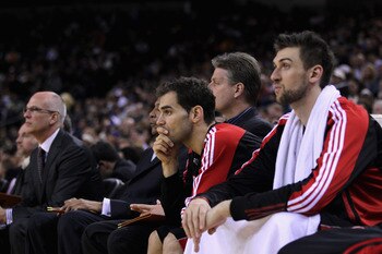 OAKLAND, CA - MARCH 25: Jose Calderon #8 of the Toronto Raptors sits on the bench during their loss to the Golden State Warriors at Oracle Arena on March 25, 2011 in Oakland, California. NOTE TO USER: User expressly acknowledges and agrees that, by downlo