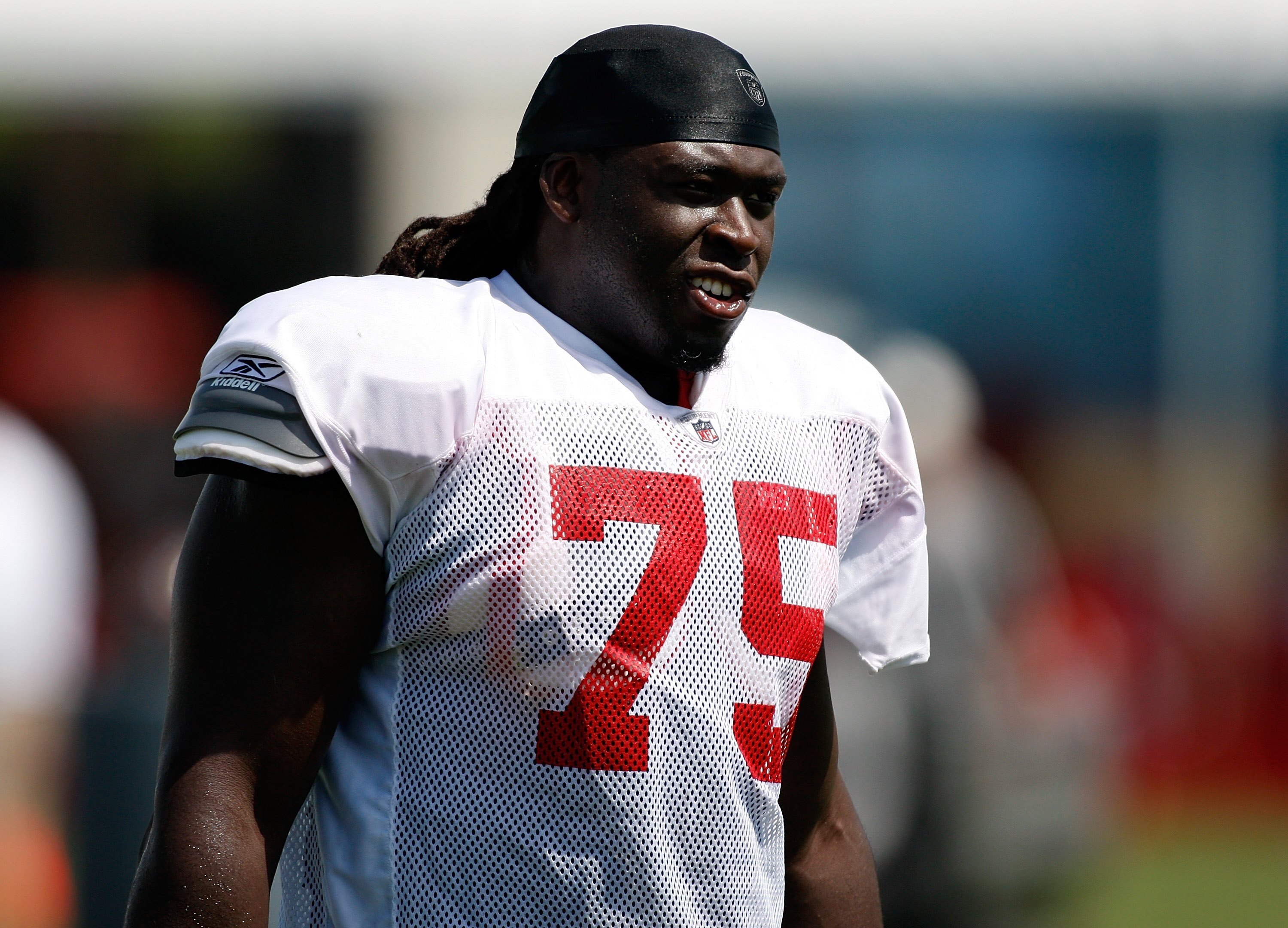 TAMPA - AUGUST 01:  Guard Davin Joseph #75 of the Tampa Bay Buccaneers works out during Training Camp at One Buccaneer Place on August 1, 2009 in Tampa, Florida.  (Photo by J. Meric/Getty Images)