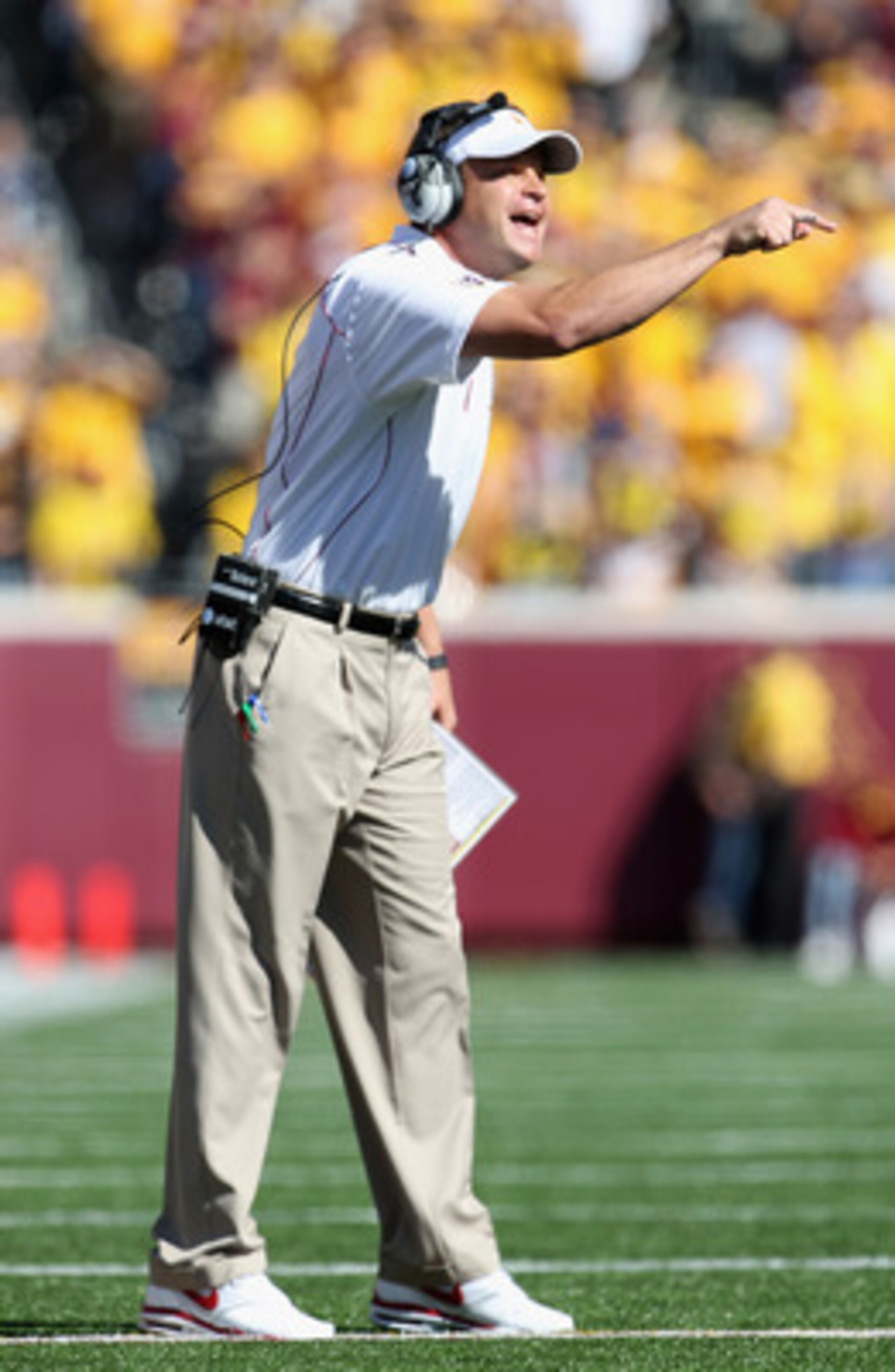 MINNEAPOLIS - SEPTEMBER 18:  Head coach Lane Kiffin of the USC Trojans instructs players from the sidelines during the game against the Minnesota Golden Gophers on September 18, 2010 at TCF Bank Stadium in Minneapolis, Minnesota.  (Photo by Jamie Squire/G