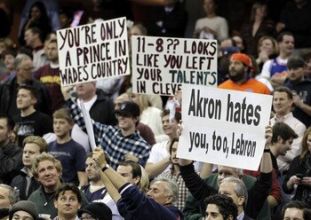 CLEVELAND, OH - DECEMBER 02:  Fans hold up signs prior to the Cleveland Cavaliers playing the Miami Heat at Quicken Loans Arena on December 2, 2010 in Cleveland, Ohio. NOTE TO USER: User expressly acknowledges and agrees that, by downloading and or using