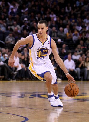 OAKLAND, CA - MARCH 25:  Stephen Curry #30 of the Golden State Warriors in action against the Toronto Raptors at Oracle Arena on March 25, 2011 in Oakland, California. NOTE TO USER: User expressly acknowledges and agrees that, by downloading and or using 