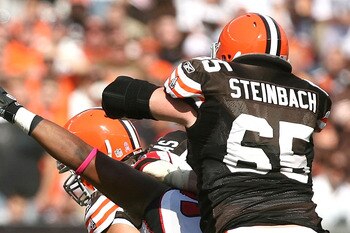 CLEVELAND - OCTOBER 10: Quarterback Seneca Wallace #6 of the Cleveland Browns gets a block from Eric Steinbach #65 as he runs from defender Kroy Biermann #71 of the Atlanta Falcons at Cleveland Browns Stadium on October 10, 2010 in Cleveland, Ohio. (Pho CLEVELAND - OCTOBER 10: Quarterback Seneca Wallace #6 of the Cleveland Browns gets a block from Eric Steinbach #65 as he runs from defender Kroy Biermann #71 of the Atlanta Falcons at Cleveland Browns Stadium on October 10, 2010 in Cleveland, Ohio. (Pho