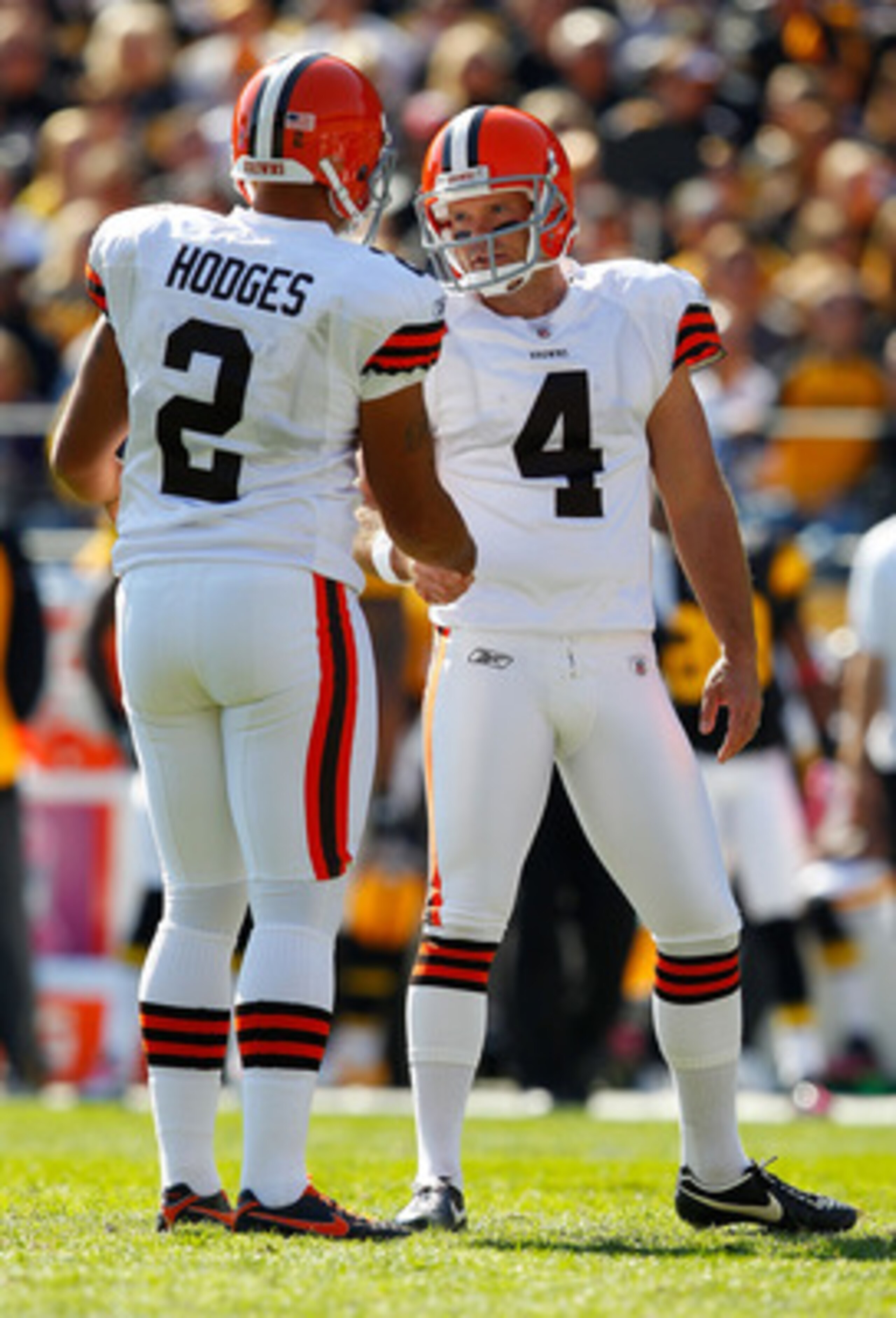 PITTSBURGH - OCTOBER 17:  Phil Dawson #4 is congratulated by teammate Reggie Hodges #2 after kicking a field goal against the Pittsburgh Steelers of the Cleveland Browns during the game on October 17, 2010 at Heinz Field in Pittsburgh, Pennsylvania.  (Pho