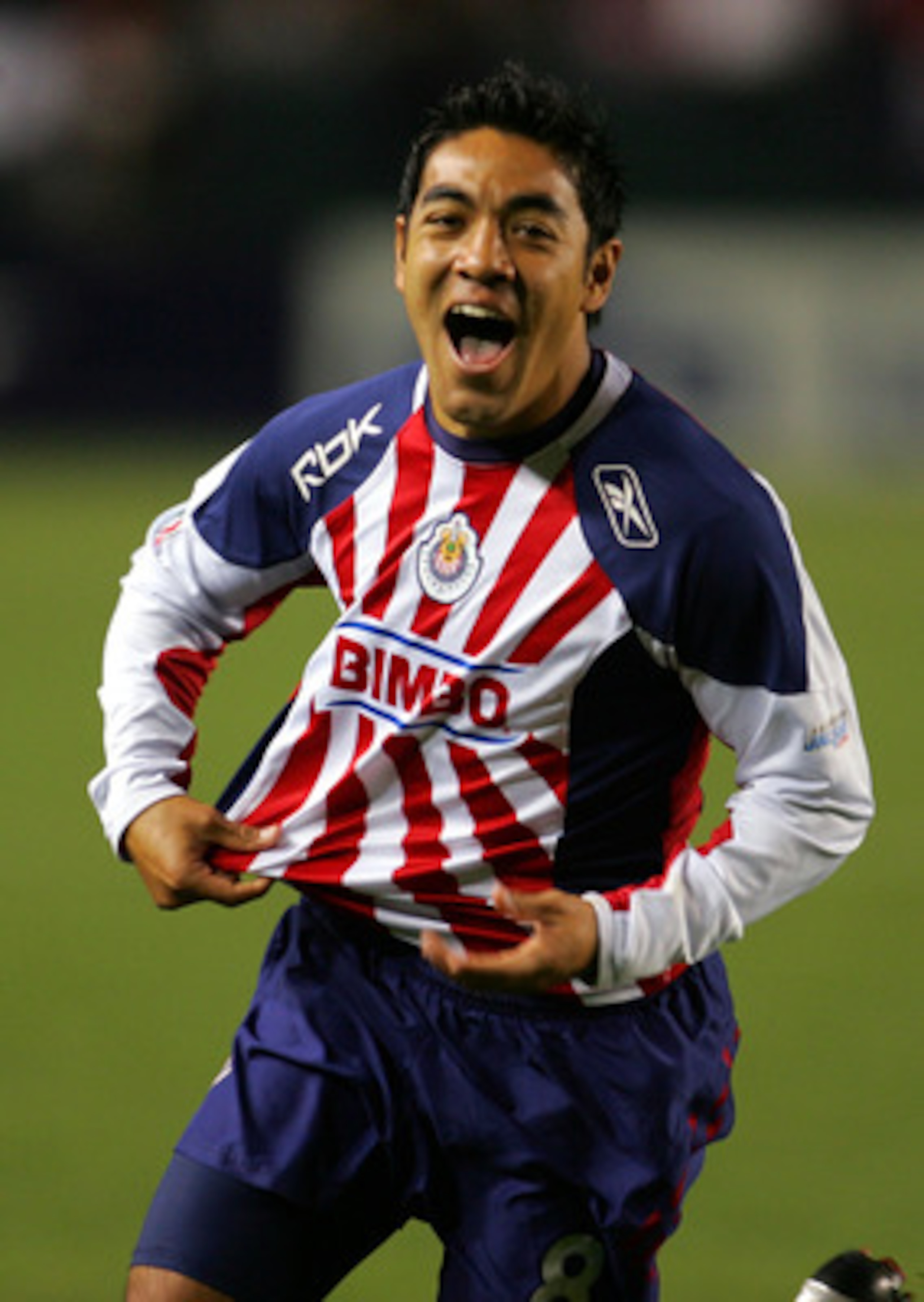 CARSON, CA - JANUARY 11: Marco Fabian #8 of CD Chivas de Guadalajara celebrates after tying the game 1-1 in the second half during their InterLiga match against Morelia at The Home Depot Center on January 11, 2009 in Carson, California. Chivas defeated Mo
