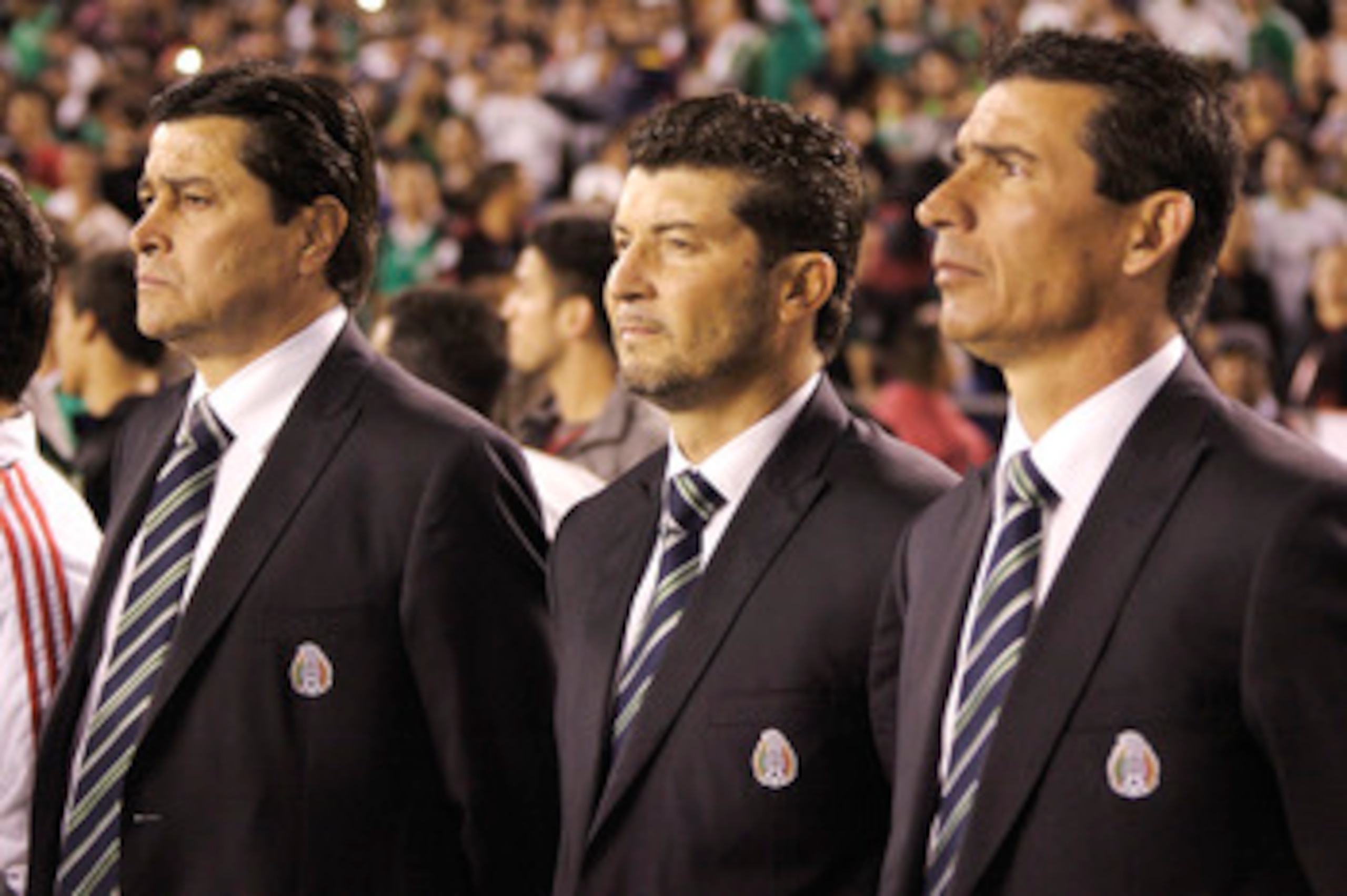 SAN DIEGO, CA - MARCH 29:  Coach Jose Manuel de la Torre (C), of Mexico stands with his assistant coaches Luis Fernando Tena, (L), and Edwardo de la Torre, (R), prior to the game against Venezuela at Qualcomm Stadium on March 29, 2011 in San Diego, Califo