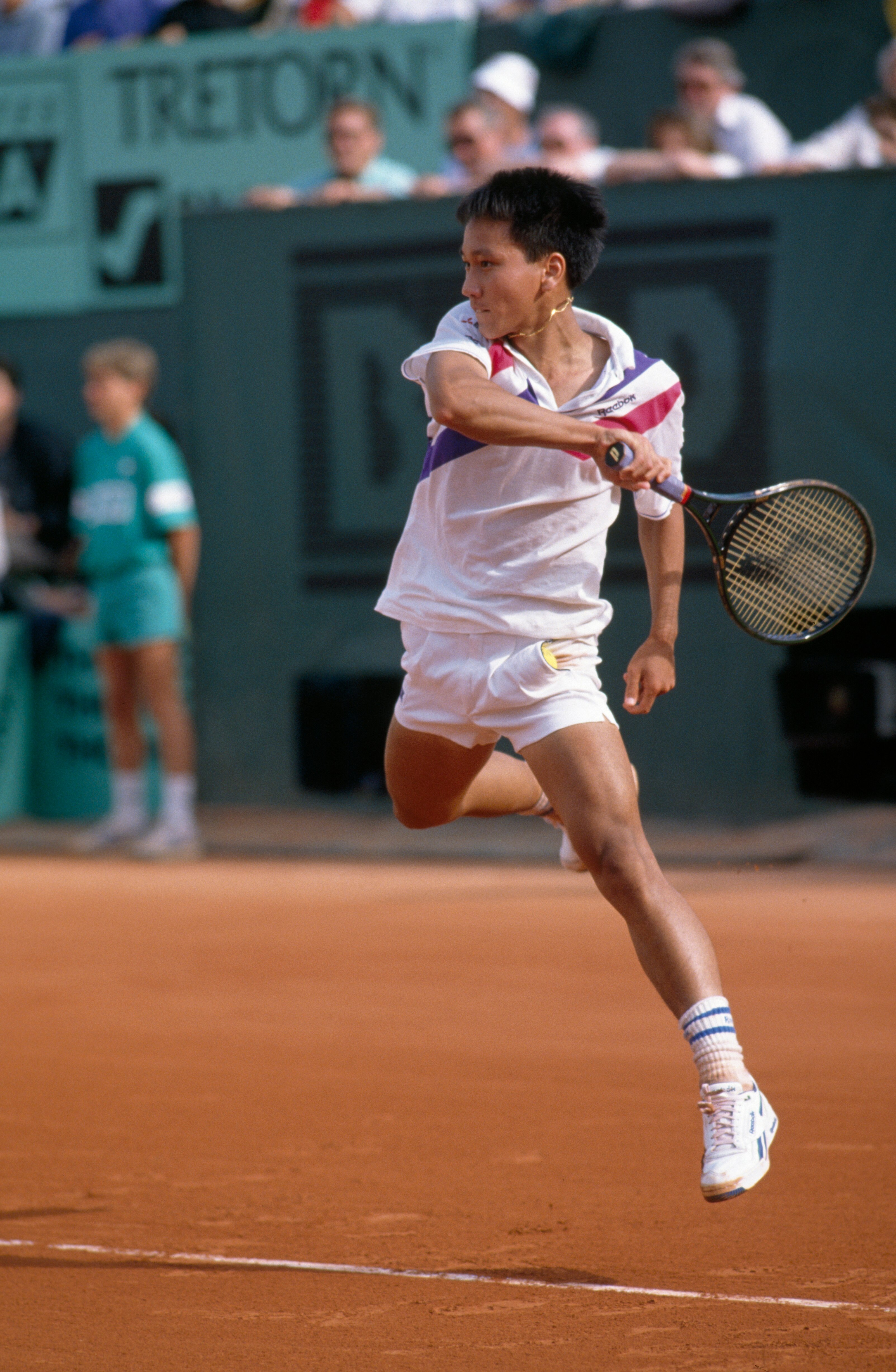 American tennis player Michael Chang at the French Open in Paris, 1989. He won the tournament, becoming the youngest male winner of a Grand Slam singles event at the age of 17. (Photo by Bob Martin/Getty Images)