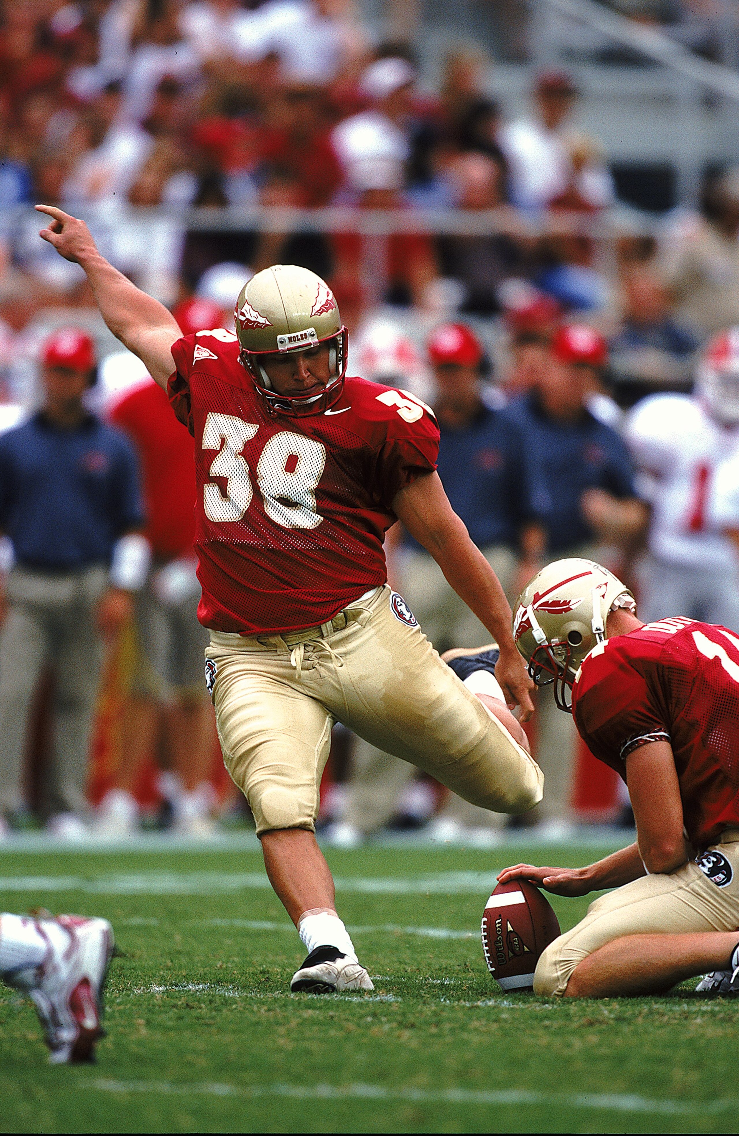 18 Sep 1999: Sebastian Janikowski #38 of the Florida State Seminoles moves to kick the ball during the game against the North Carolina State Wolfpack at the Doke Campbell Stadium in Tallahassee, Florida. The Seminoles defeated the Wolfpack 42-11.