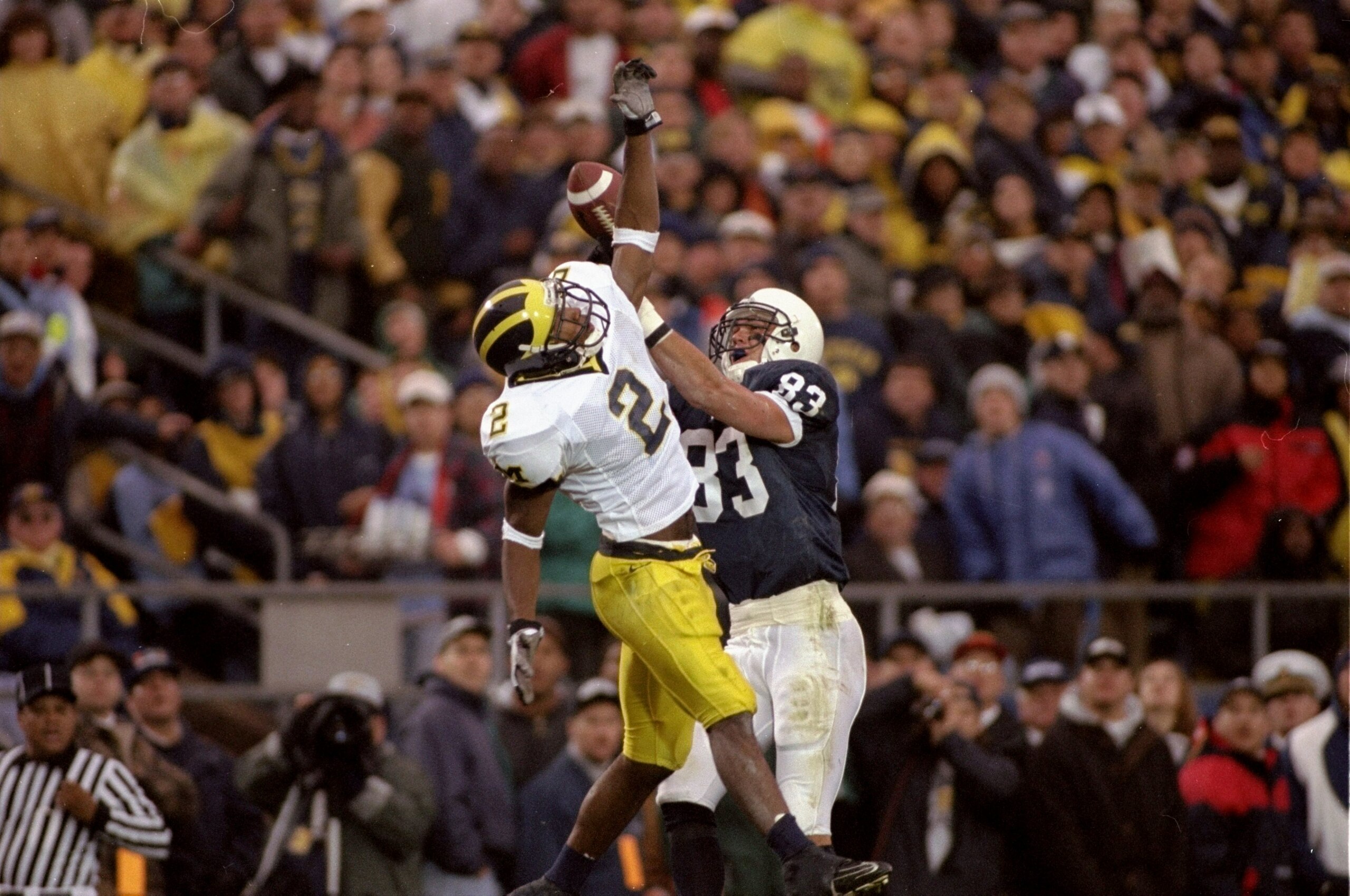8 Nov 1997:  Defensive back Charles Woodson of the Michigan Wolverines in action during a game against the Penn State Nittany Lions at Beaver Stadium in State College, Pennsylvania.  Michigan won the game, 34-10. Mandatory Credit: Rick Stewart  /Allsport