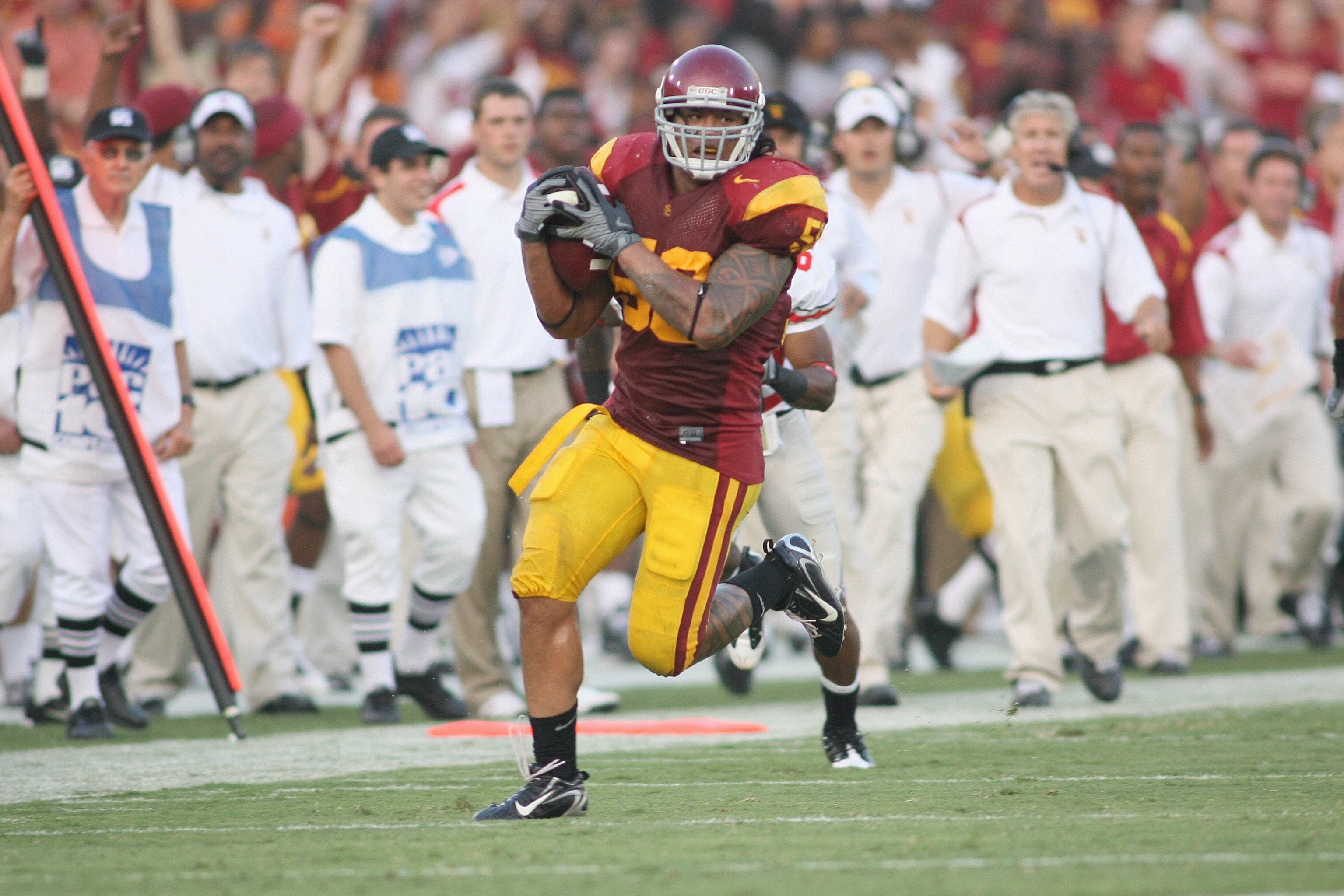 LOS ANGELES - SEPTEMBER 13:  Rey Maualuga #58 of the USC Trojans returns an interception 48 yards for a touchdown against the Ohio State Buckeyes in the second quarter on September 13, 2008 at the Los Angeles Memorial Coliseum in Los Angeles, California.