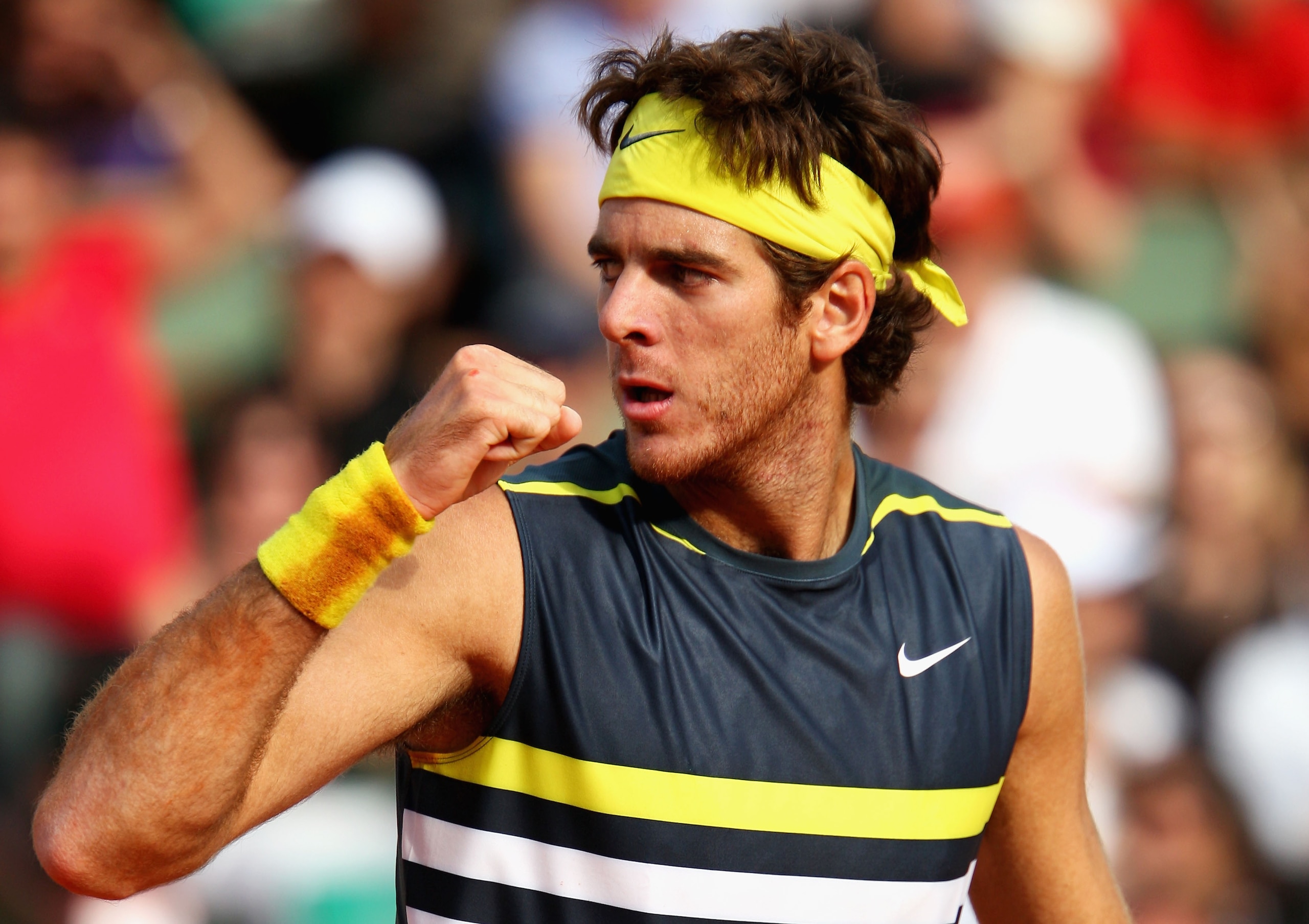 PARIS - JUNE 05:  Juan Martin Del Potro of Argentina celebrates a point during the Men's Singles Semi Final match against Roger Federer of Switzerland on day thirteen of the French Open at Roland Garros on June 5, 2009 in Paris, France.  (Photo by Clive B