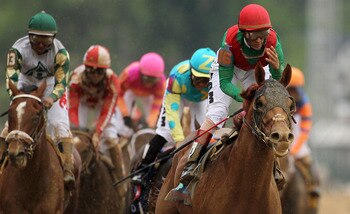 LOUISVILLE, KY - MAY 07:  Jockey John Valazquez, riding Animal Kingdom #16, celebrates winning the 137th Kentucky Derby at Churchill Downs on May 7, 2011 in Louisville, Kentucky.  (Photo by Al Bello/Getty Images)
