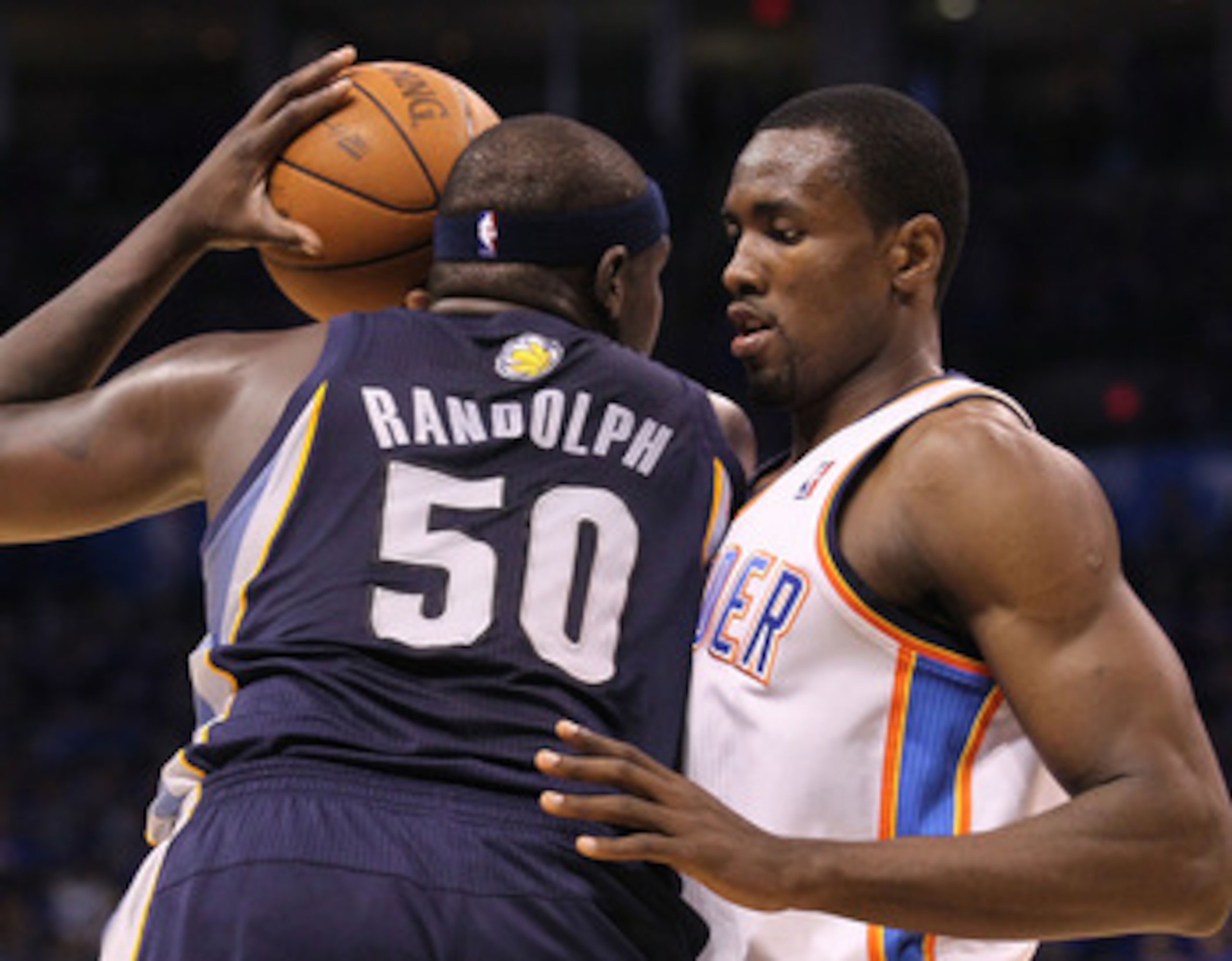 OKLAHOMA CITY, OK - MAY 15:  Forward Serge Ibaka #9 of the Oklahoma City Thunder guards against Zach Randolph #50 of the Memphis Grizzlies in Game Seven of the Western Conference Semifinals in the 2011 NBA Playoffs on May 15, 2011 at Oklahoma City Arena i
