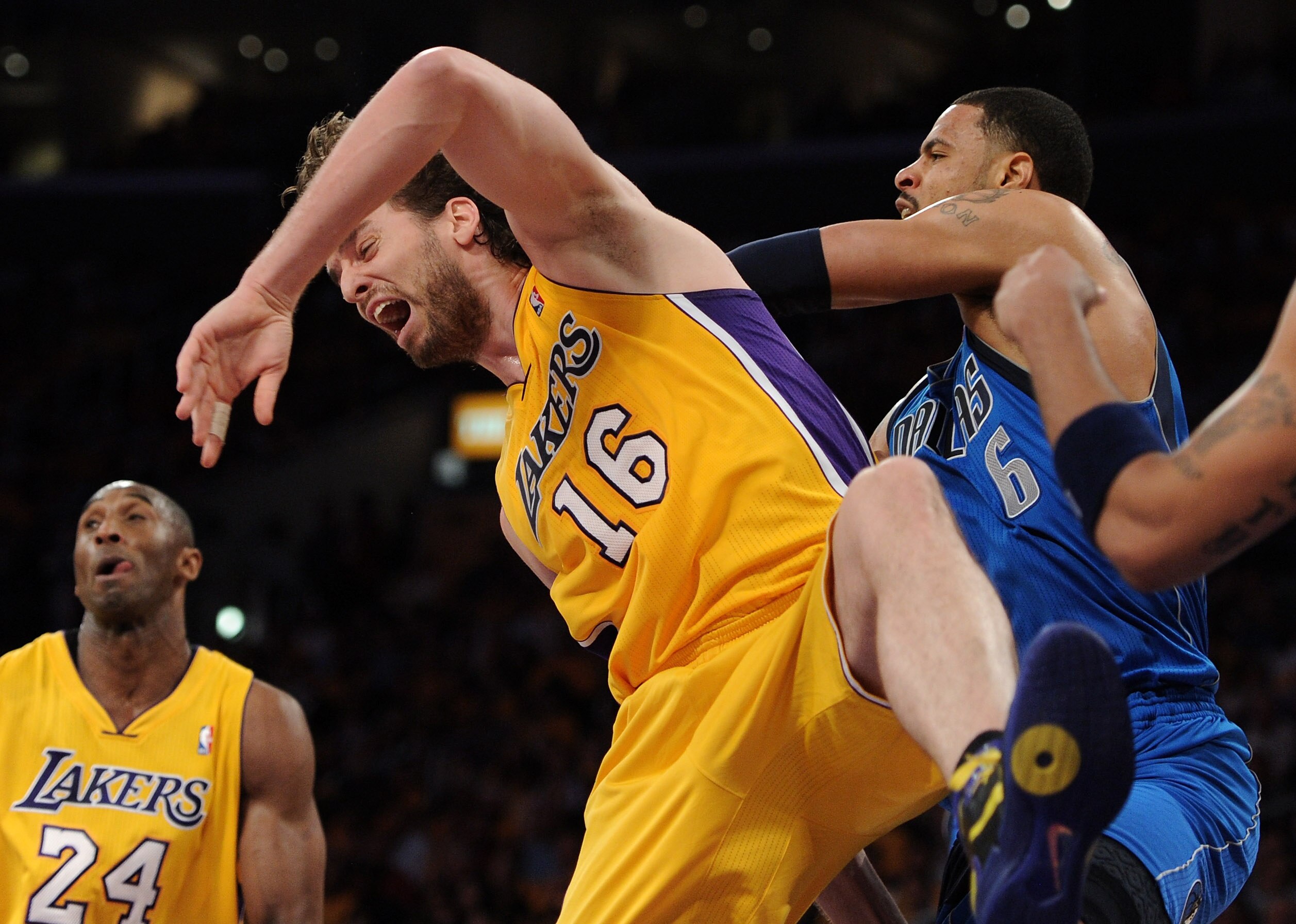 LOS ANGELES, CA - MAY 02:  Tyson Chandler #6 of the Dallas Mavericks pushes Pau Gasol #16 of the Los Angeles Lakers from behind and Chandler is called for a technical foul in in the final minutes of the second quarter in Game One of the Western Conference