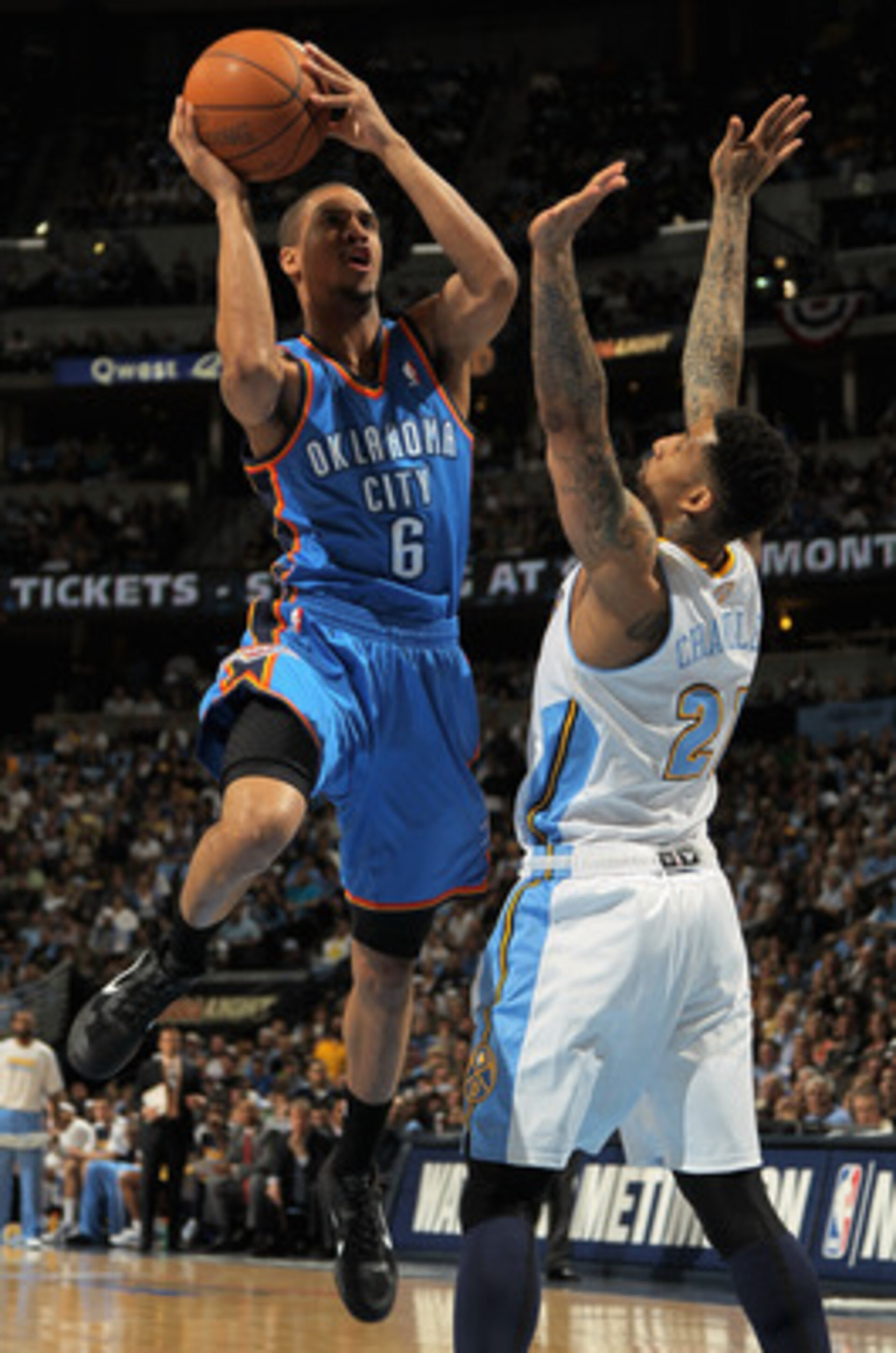 DENVER, CO - APRIL 25:  Eric Maynor #6 of the Oklahoma City Thunder takes a shot against Wilson Chandler #21 of the Denver Nuggets in Game Four of the Western Conference Quarterfinals in the 2011 NBA Playoffs on April 24, 2011 at the Pepsi Center in Denve