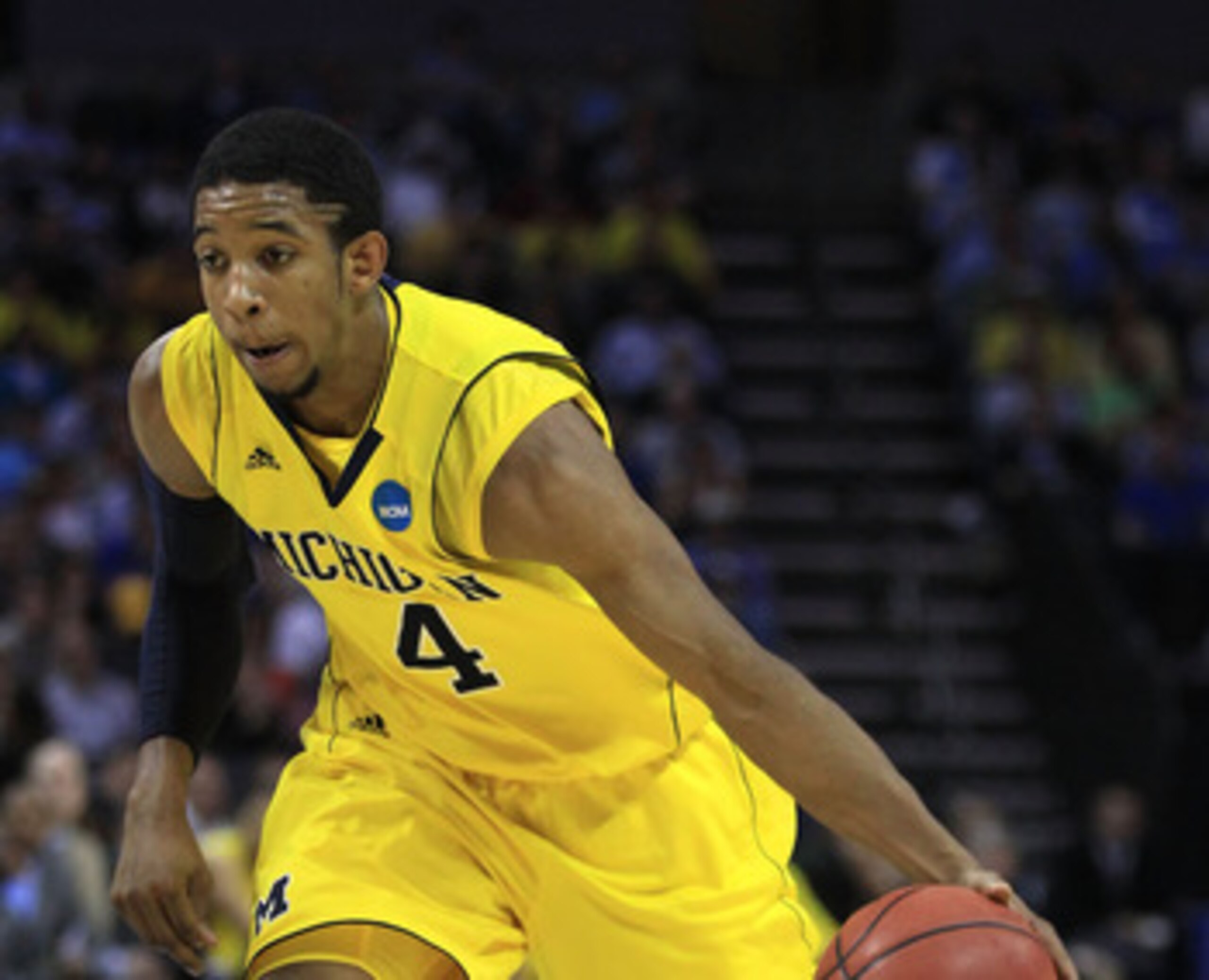 CHARLOTTE, NC - MARCH 20:  Darius Morris #4 of the Michigan Wolverines moves the ball while taking on the Duke Blue Devils during the third round of the 2011 NCAA men's basketball tournament at Time Warner Cable Arena on March 20, 2011 in Charlotte, North